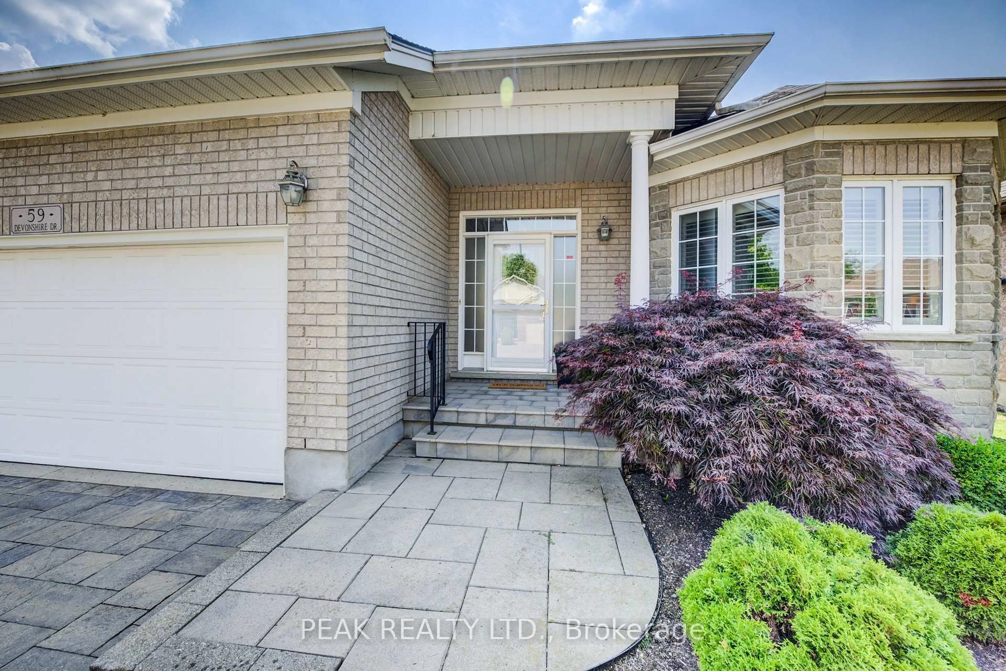 Home with brick exterior material, street for 59 Devonshire Dr, Wilmot Ontario N3A 4J6
