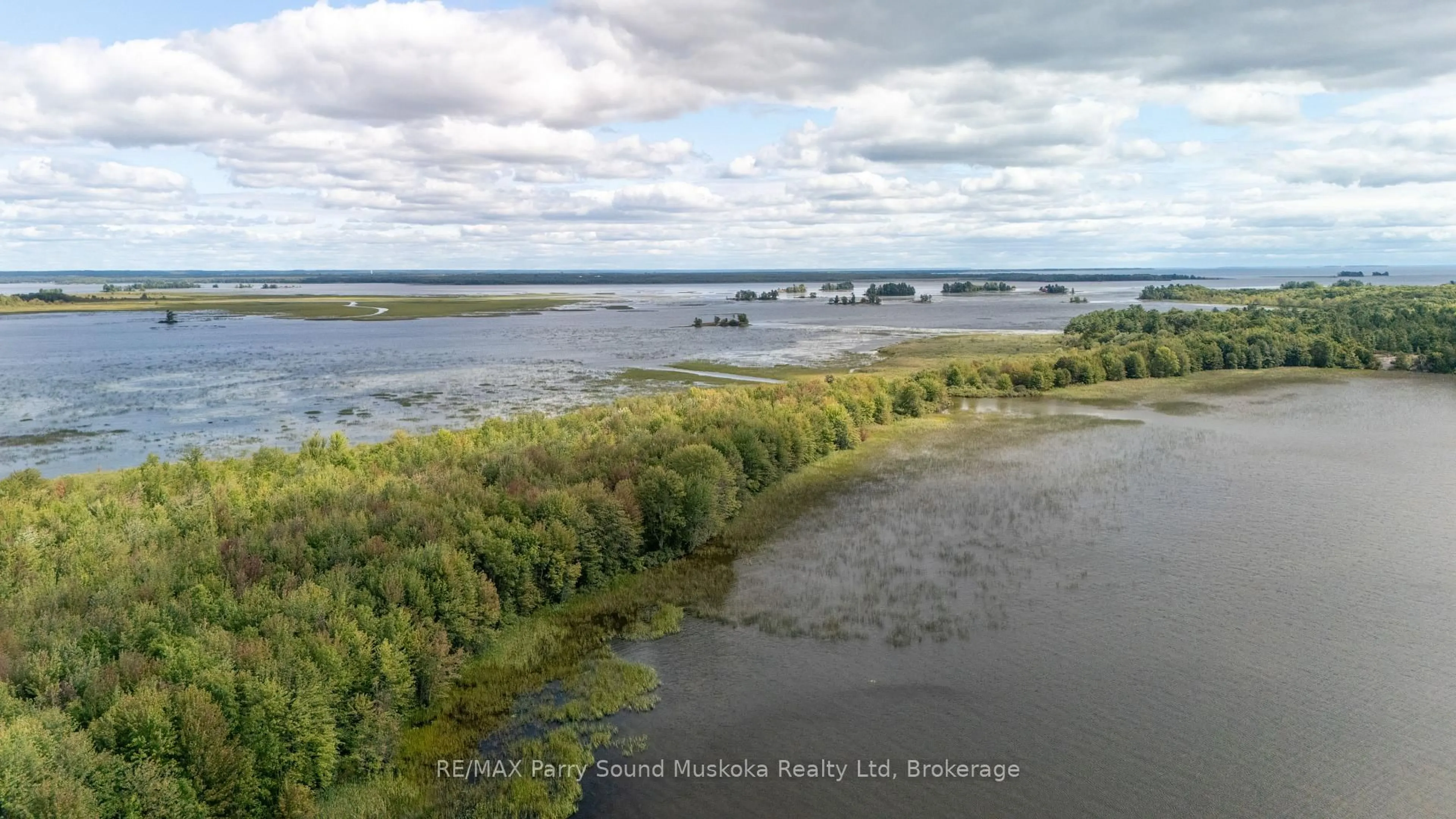 A pic from outside/outdoor area/front of a property/back of a property/a pic from drone, water/lake/river/ocean view for 38 Fortin Dr, West Nipissing Ontario P0H 2M0