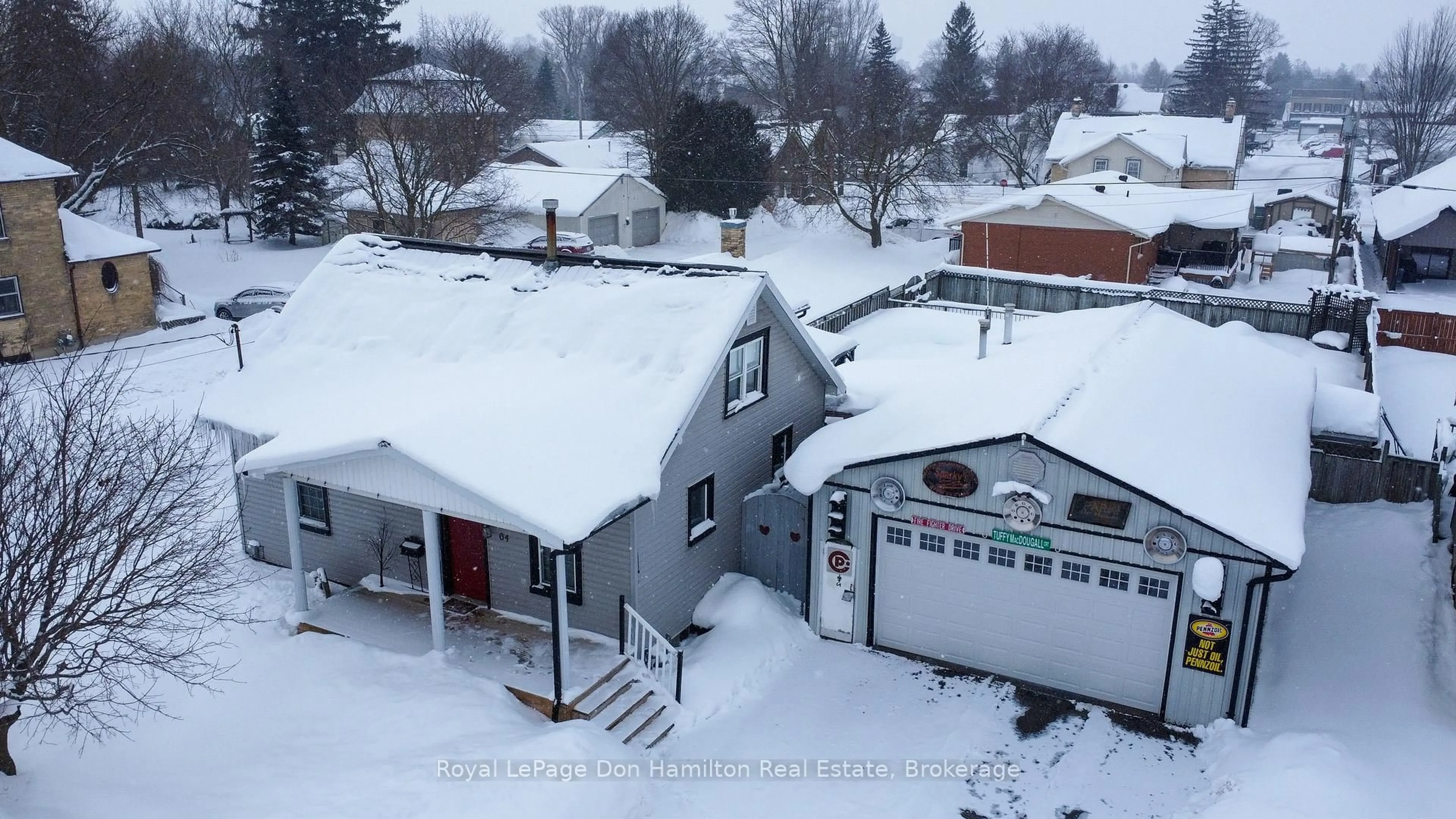 A pic from outside/outdoor area/front of a property/back of a property/a pic from drone, street for 64 George St, Minto Ontario N0G 1Z0