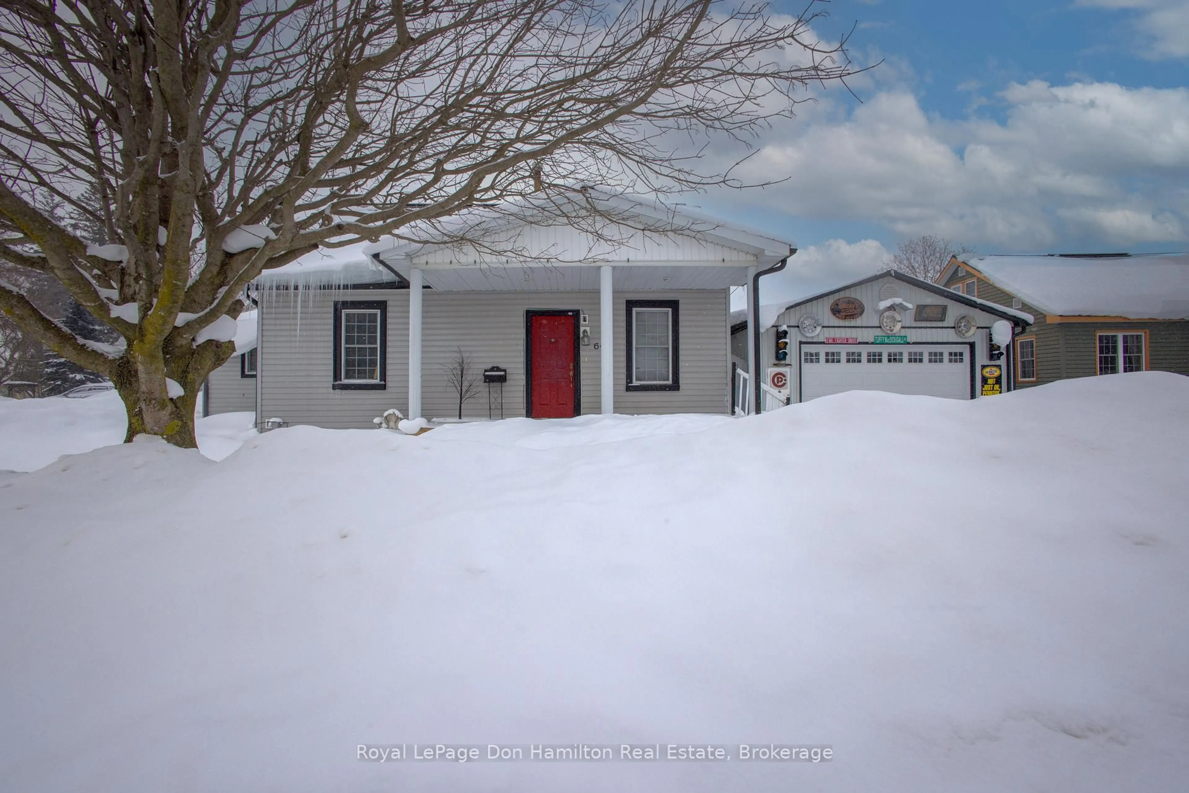 A pic from outside/outdoor area/front of a property/back of a property/a pic from drone, street for 64 George St, Minto Ontario N0G 1Z0