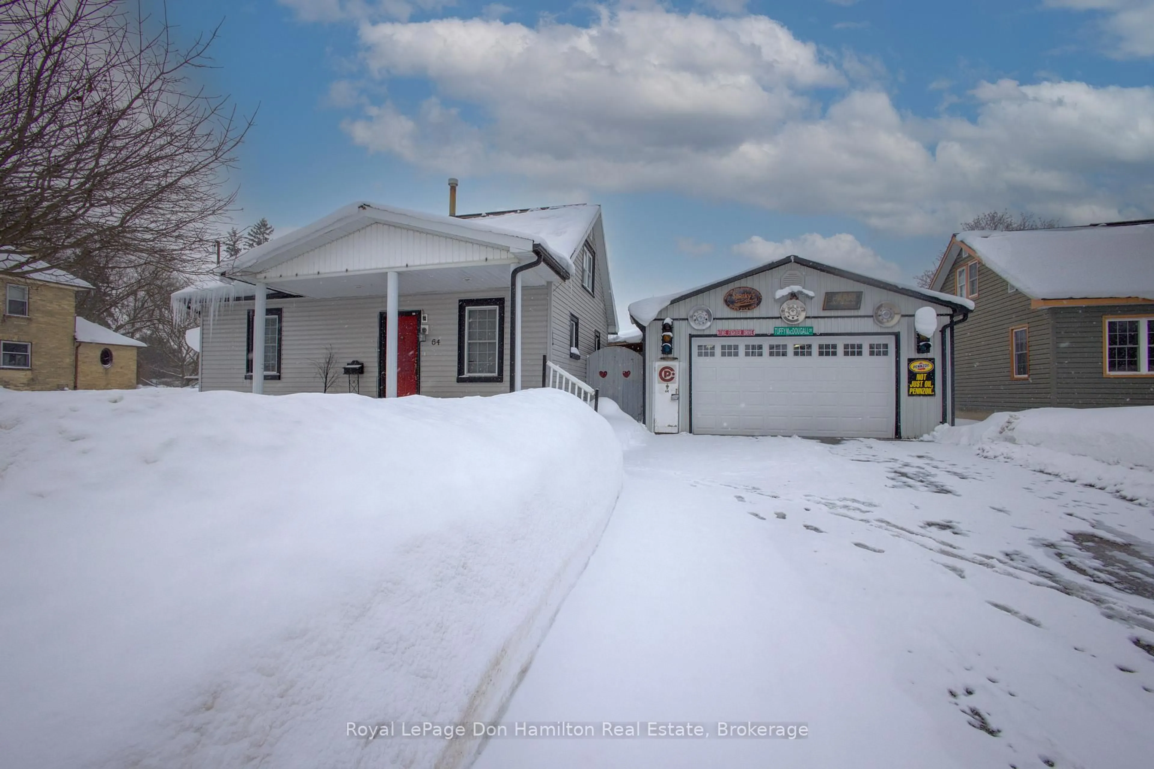 A pic from outside/outdoor area/front of a property/back of a property/a pic from drone, street for 64 George St, Minto Ontario N0G 1Z0