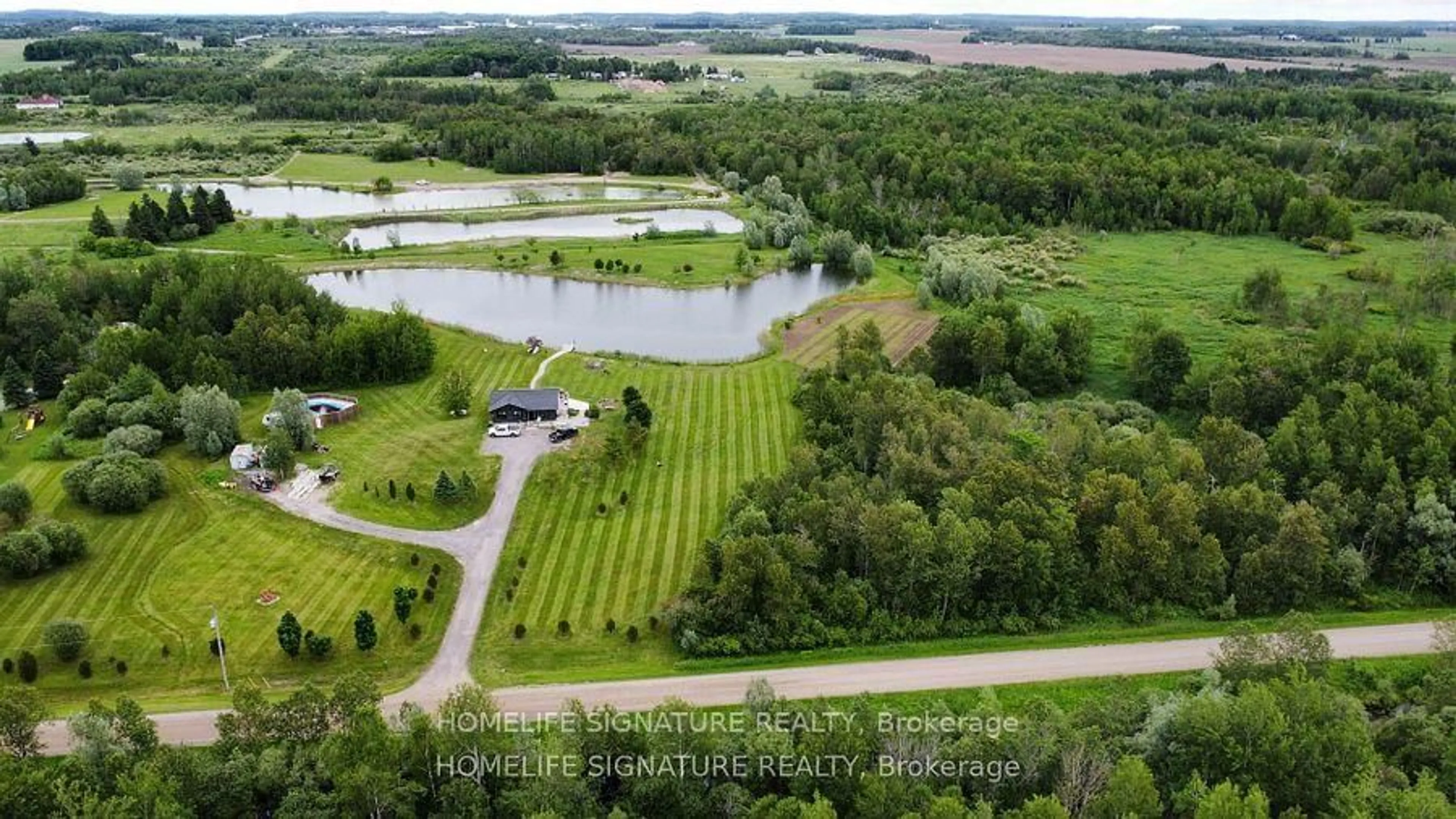 A pic from outside/outdoor area/front of a property/back of a property/a pic from drone, water/lake/river/ocean view for 375721 6th Line, Amaranth Ontario L0N 1S5