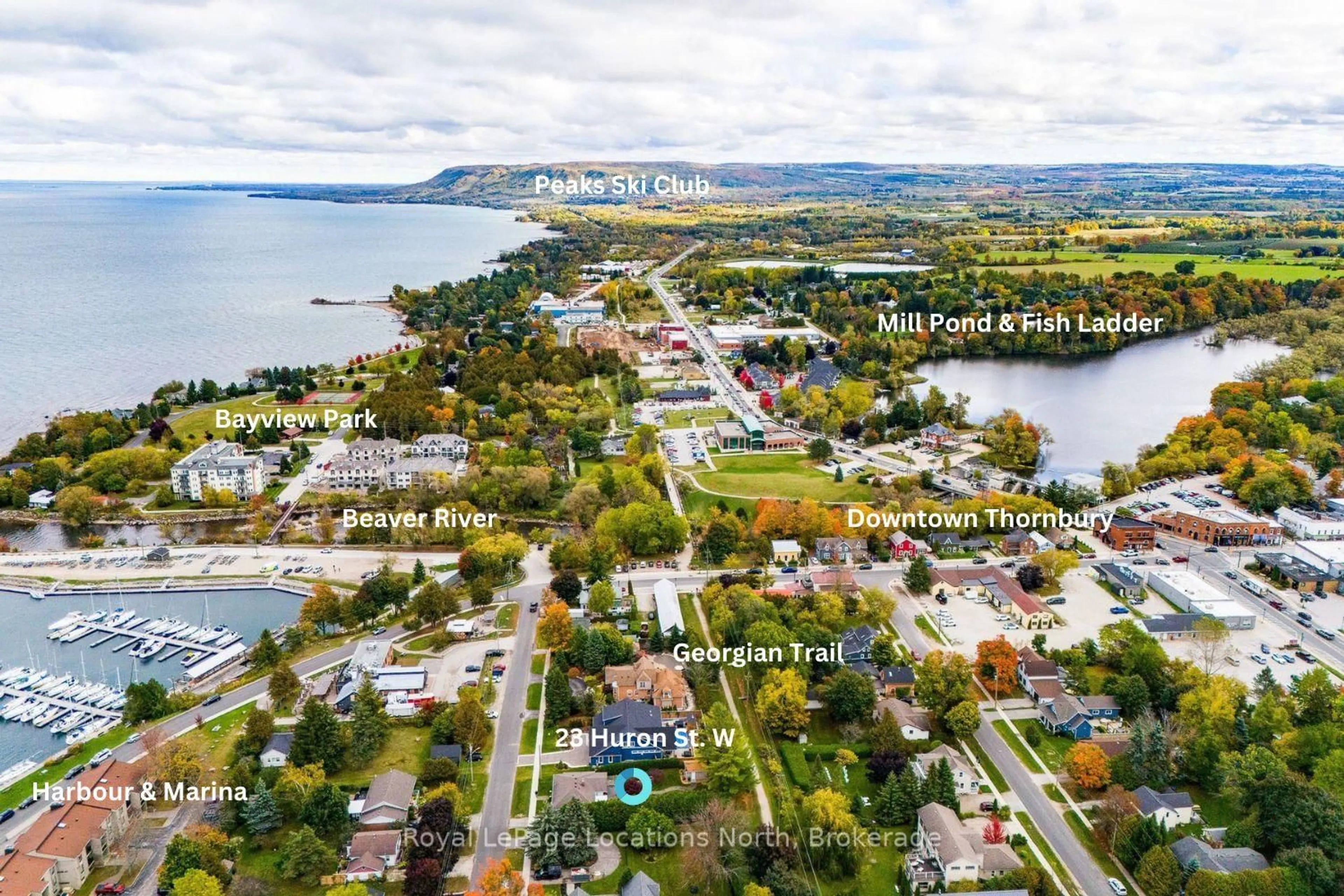 A pic from outside/outdoor area/front of a property/back of a property/a pic from drone, water/lake/river/ocean view for 23 Huron St, Blue Mountains Ontario N0H 2P0