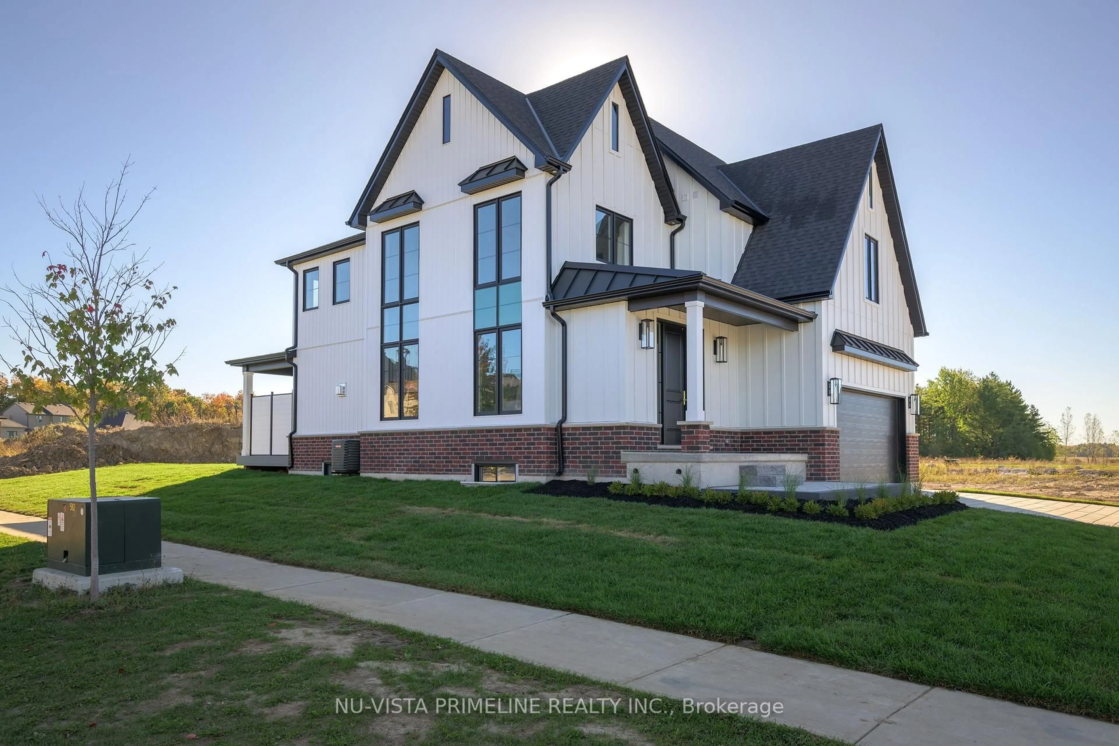 Home with brick exterior material, street for 199 Timberwalk Tr, Middlesex Centre Ontario N0M 2A0