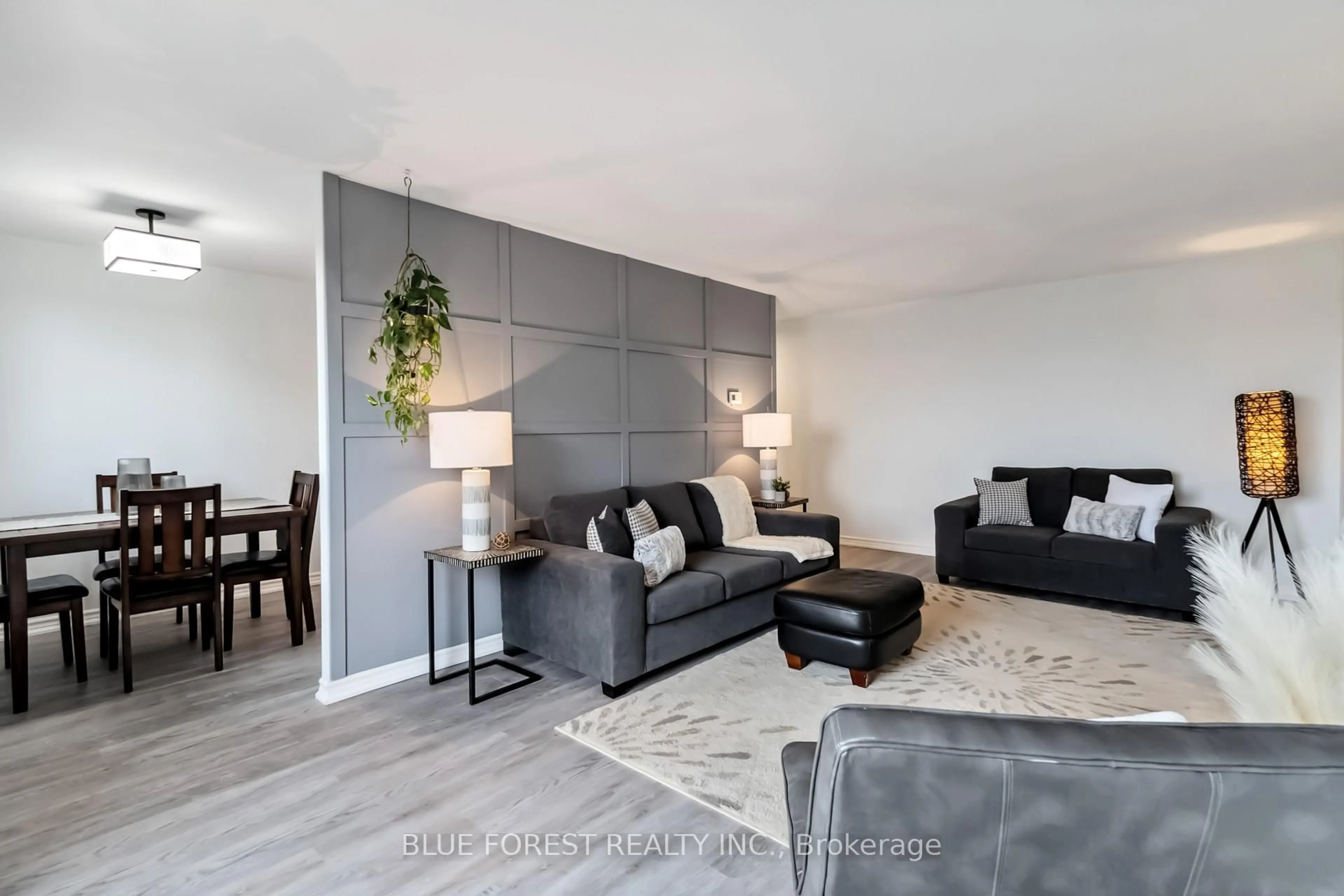 Living room with furniture, wood/laminate floor for 1100 Jalna Blvd #501, London South Ontario N6E 2M2