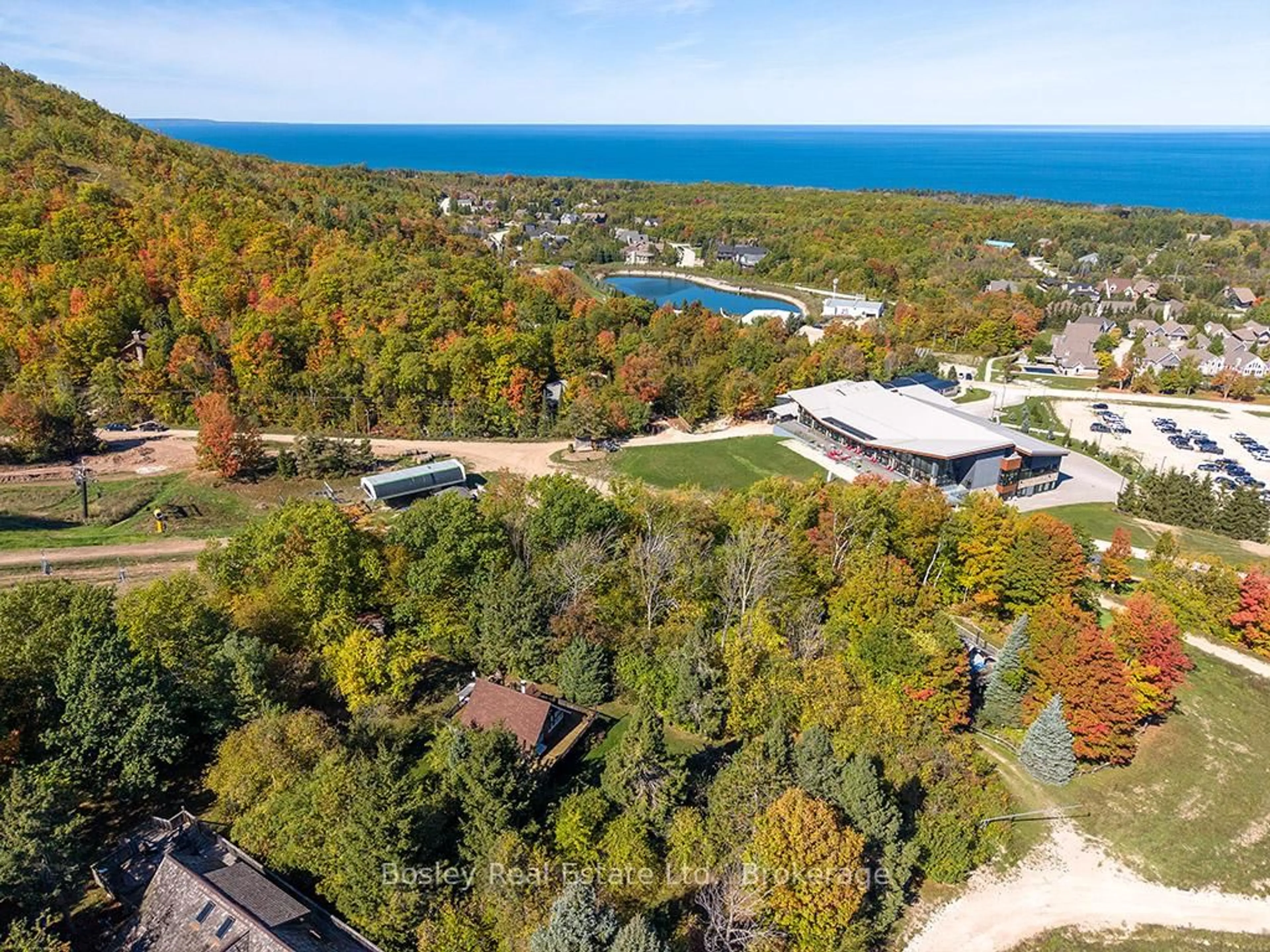 A pic from outside/outdoor area/front of a property/back of a property/a pic from drone, water/lake/river/ocean view for 242 Arrowhead Rd #3, Blue Mountains Ontario L9Y 0S1
