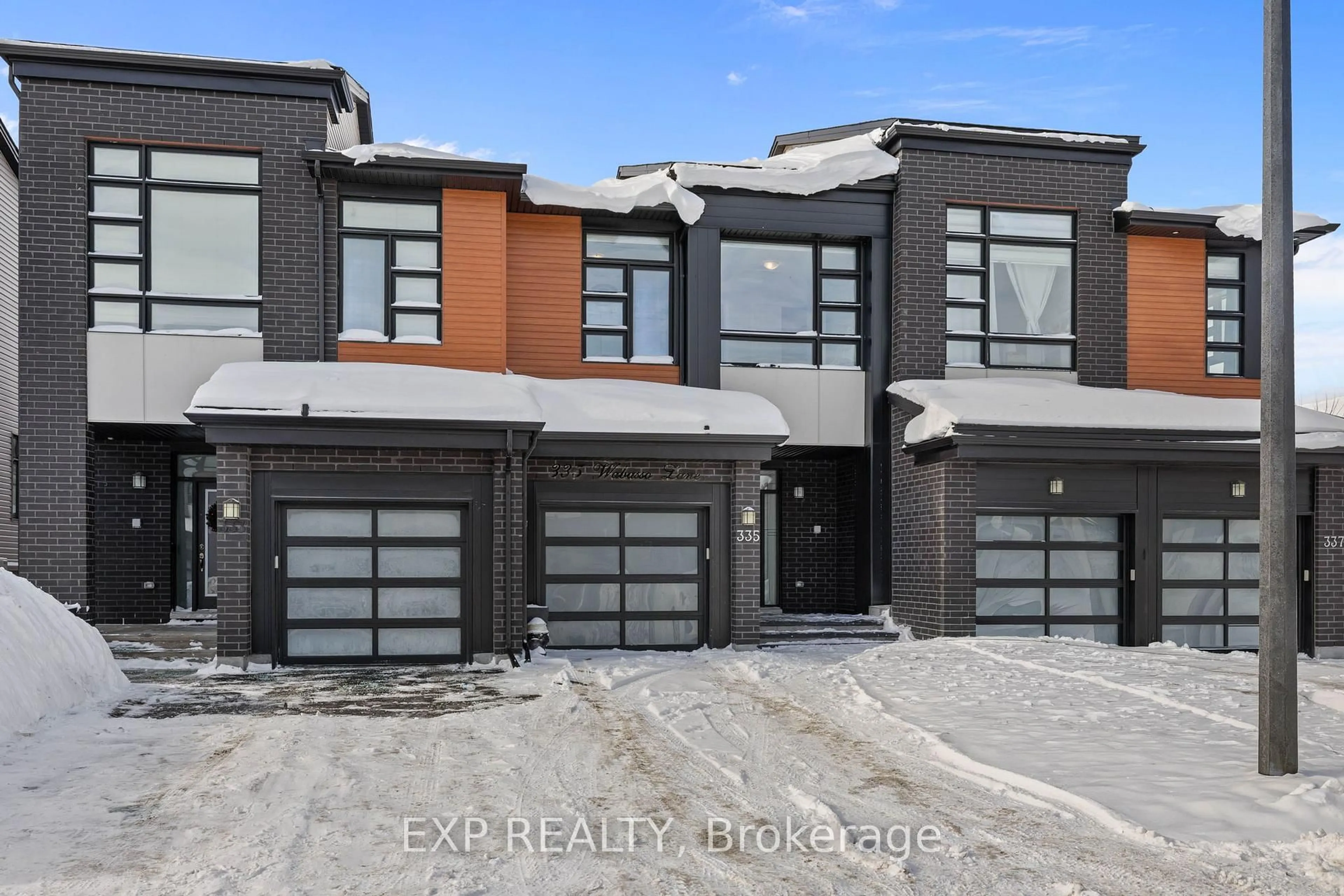 Home with brick exterior material, street for 335 wabasso Lane, Ottawa Ontario K1T 0T2