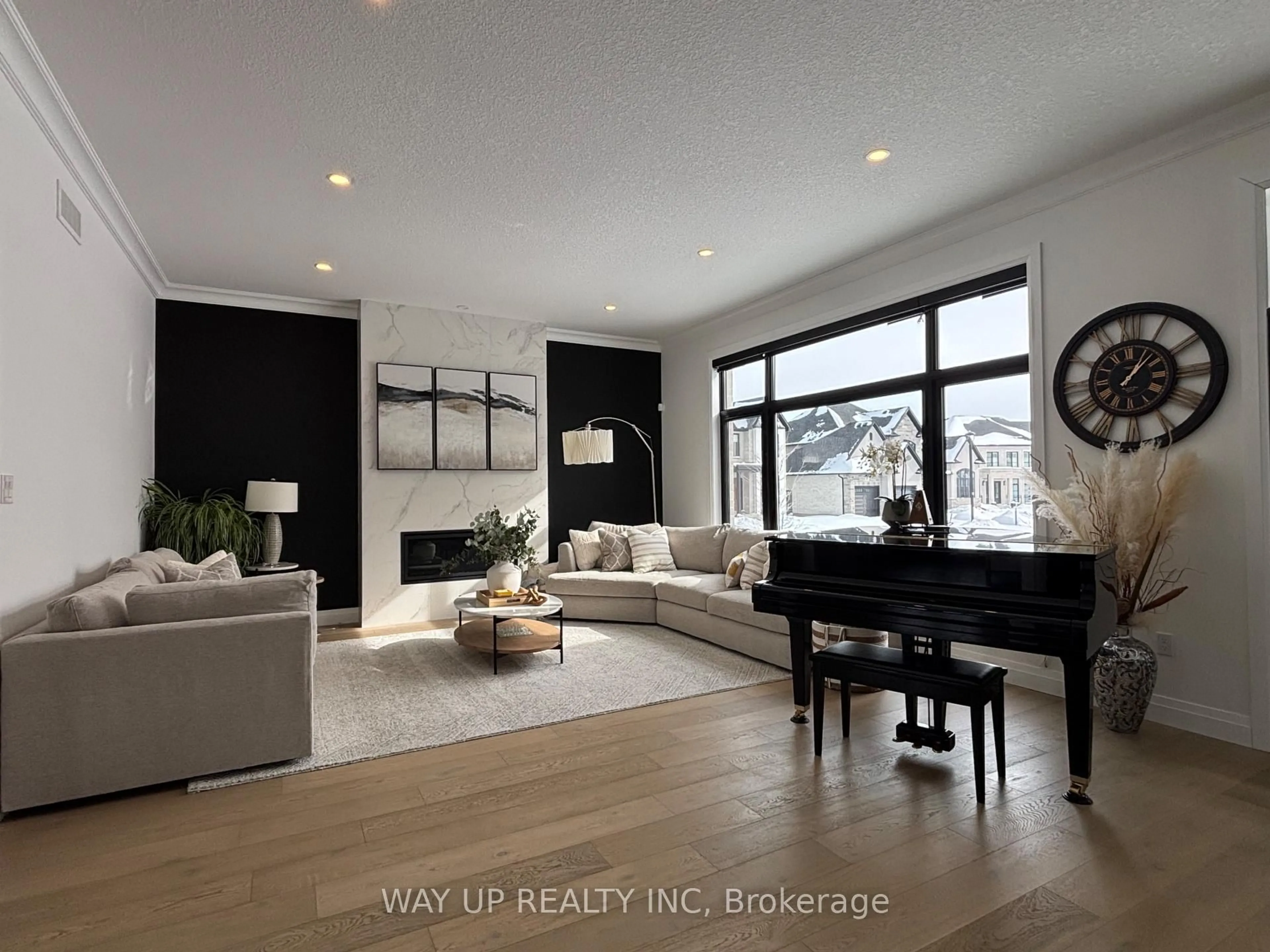 Living room with furniture, wood/laminate floor for 442 Warner Terr, London North Ontario N5G 0E6