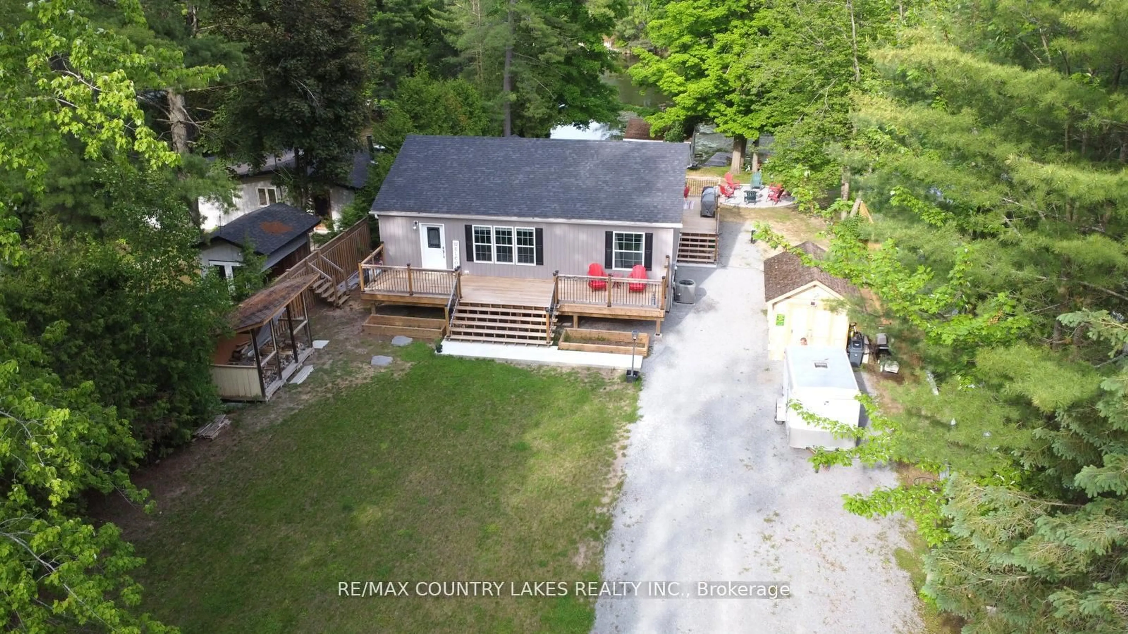 A pic from outside/outdoor area/front of a property/back of a property/a pic from drone, water/lake/river/ocean view for 113 Stanley Rd, Kawartha Lakes Ontario K0M 2T0