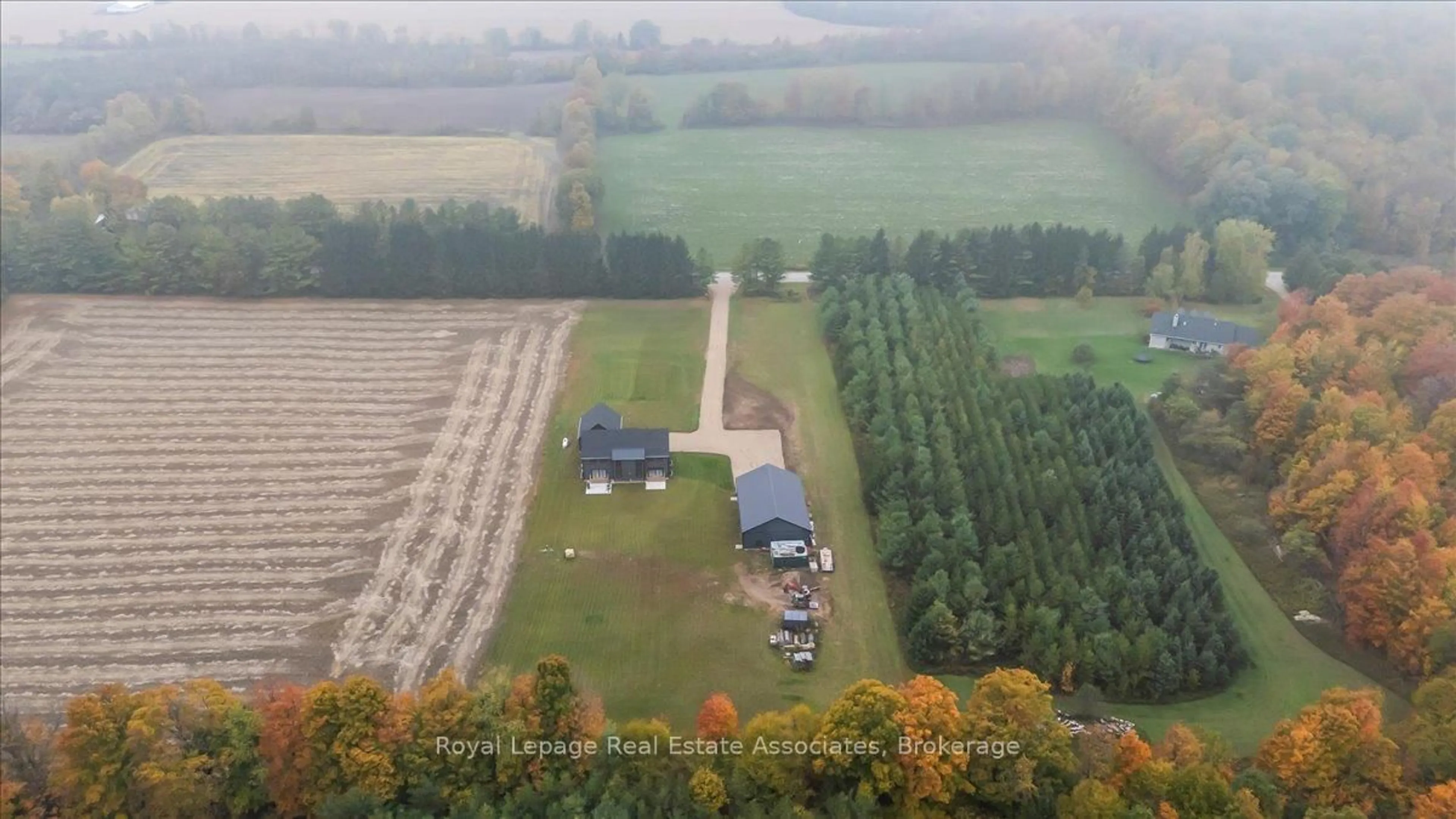 A pic from outside/outdoor area/front of a property/back of a property/a pic from drone, forest/trees view for 174265 Mulock Rd, West Grey Ontario N4N 3B9
