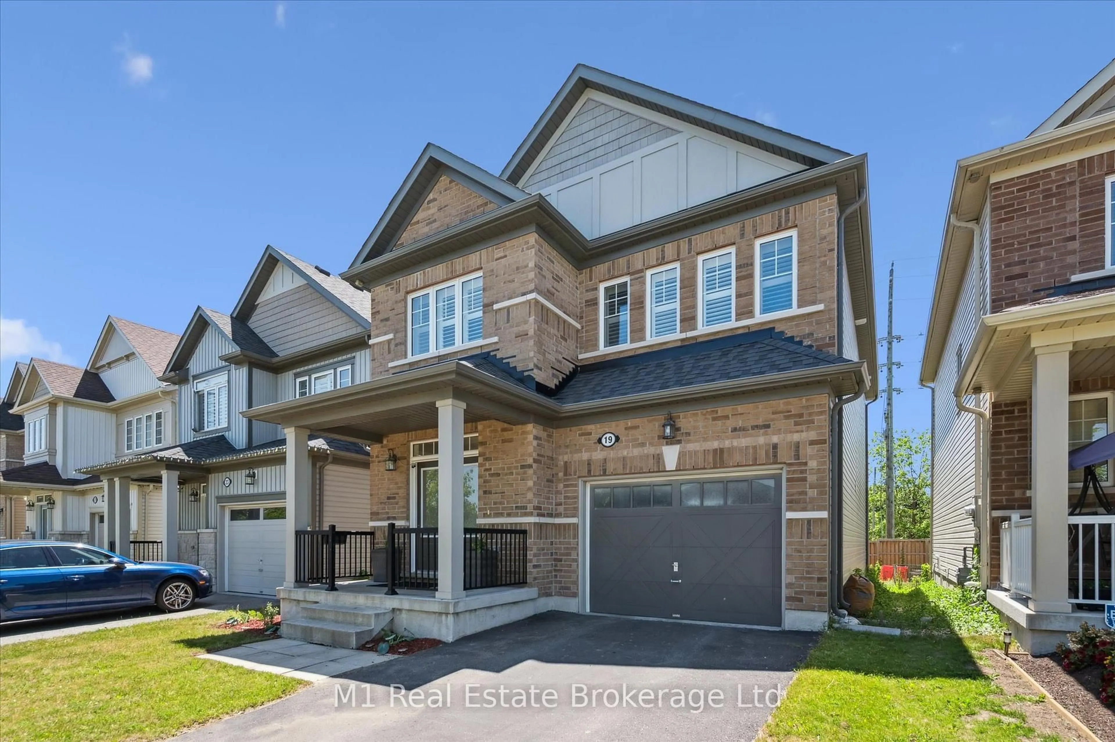 Home with brick exterior material, street for 19 Findlay Way, Centre Wellington Ontario N1M 0A4