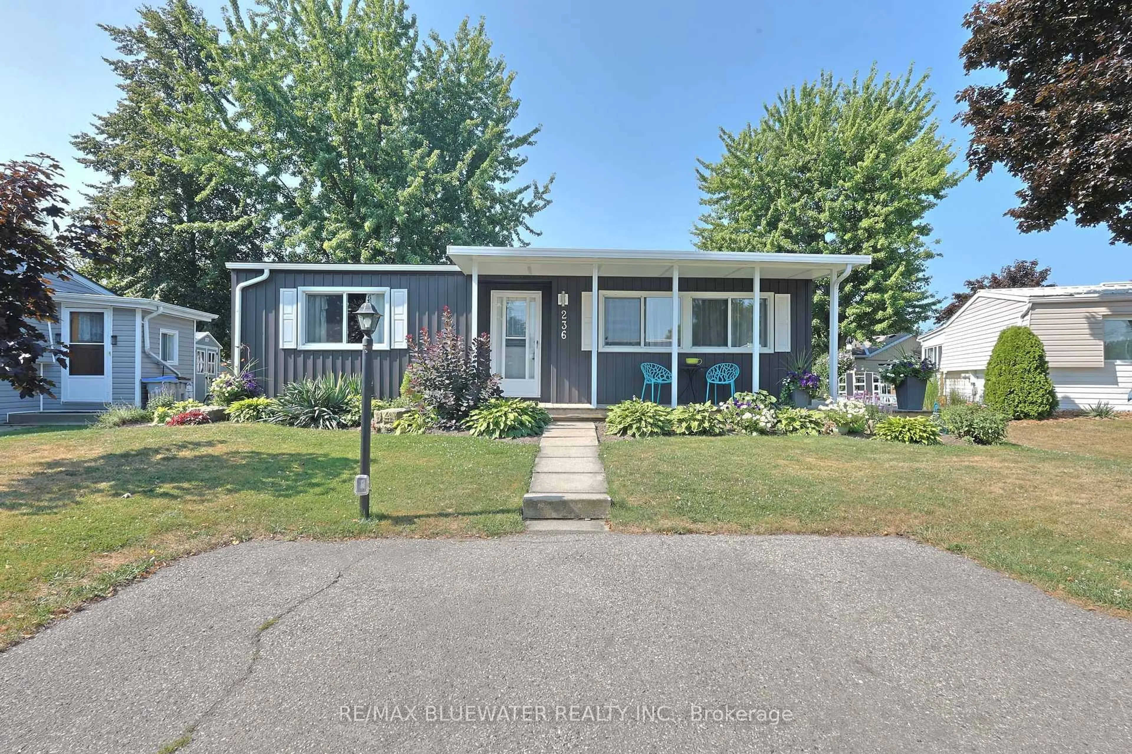 Home with vinyl exterior material, street for 236 Pebble Beach Pkwy, South Huron Ontario N0M 1T0