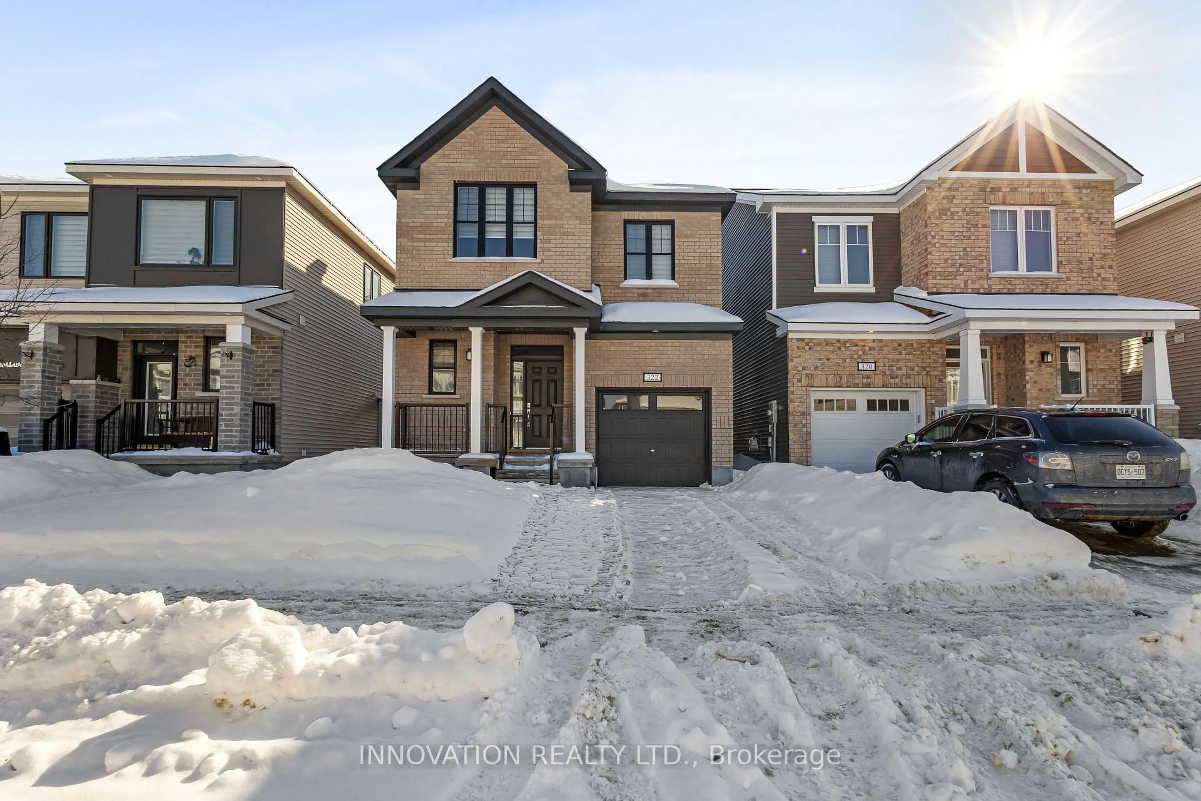 Home with brick exterior material, street for 322 Crossway Terr, Stittsville Ontario K2S 2Z3