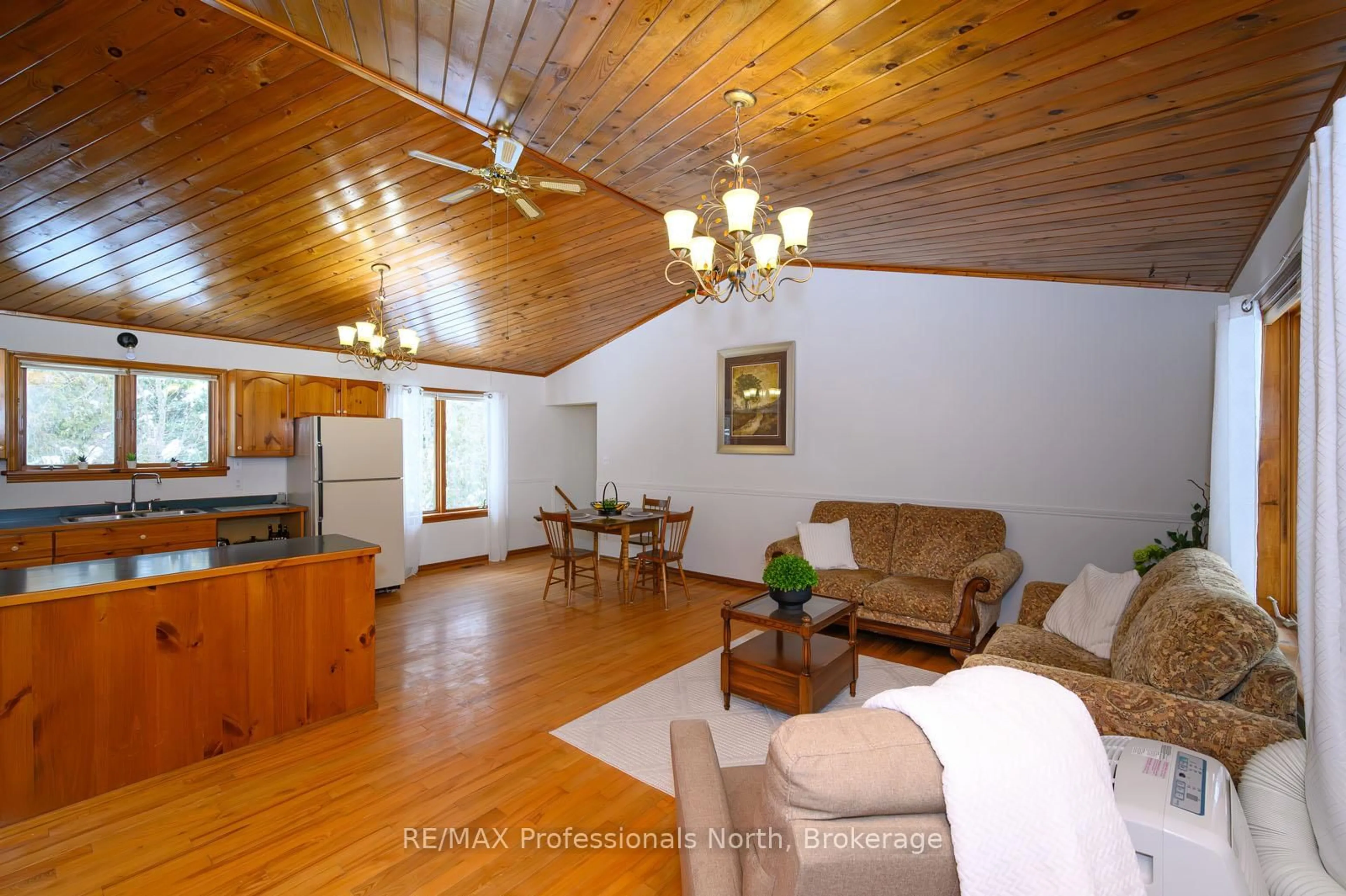 Living room with furniture, wood/laminate floor for 66 Rain Lake Rd, Kearney Ontario P0A 1M0