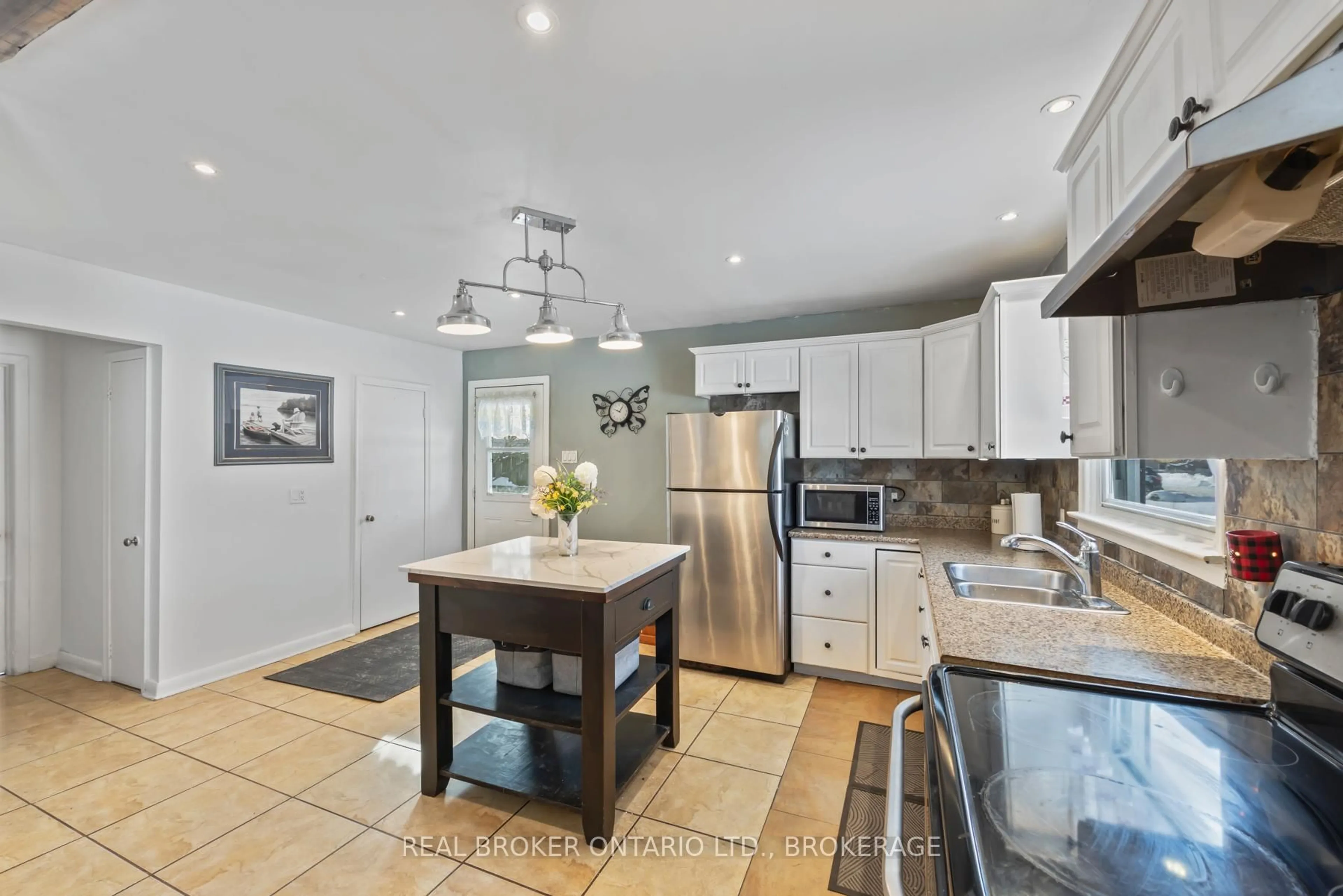 Open concept kitchen, ceramic/tile floor for 4380 William St, Harrowsmith Ontario K0H 1V0