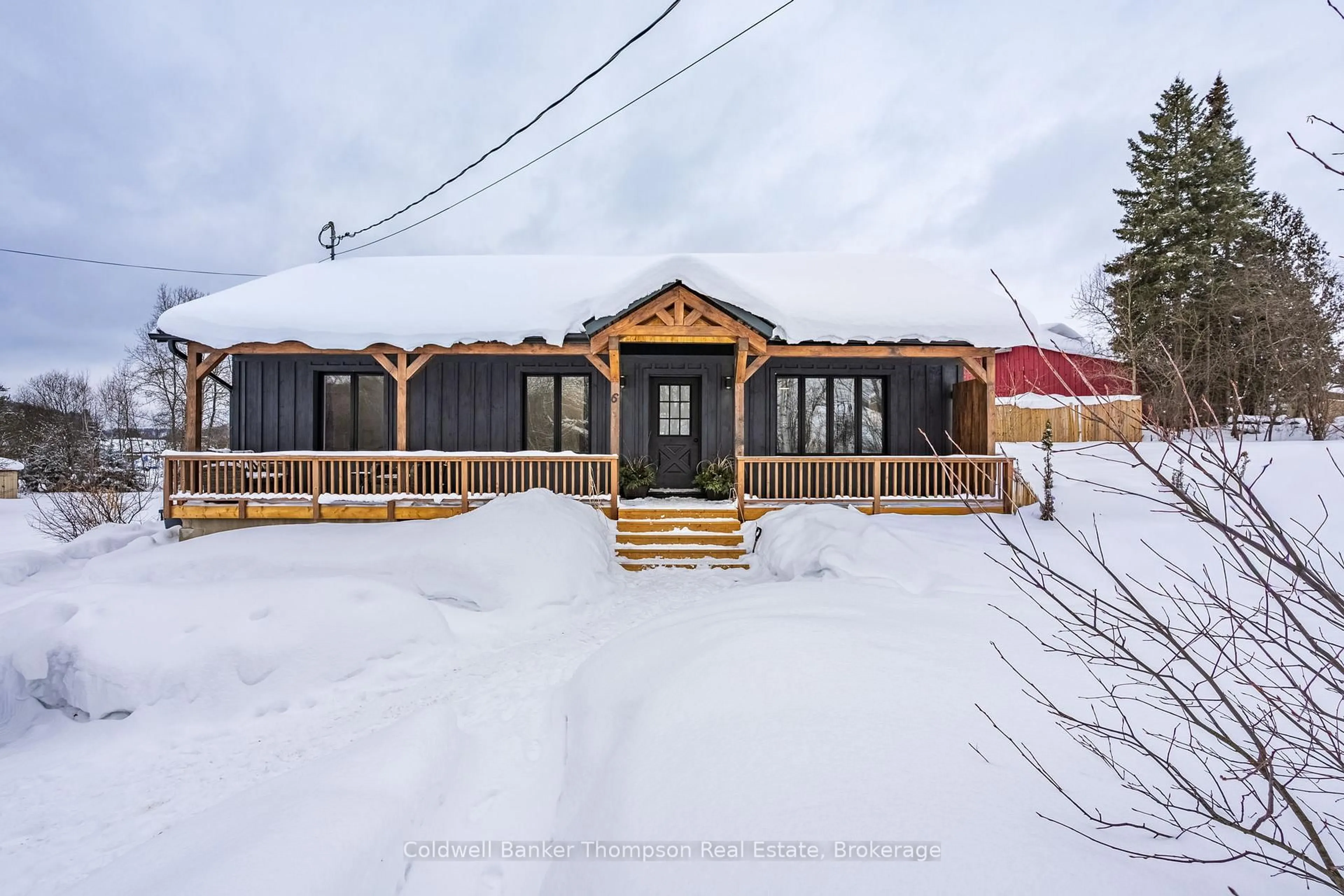 A pic from outside/outdoor area/front of a property/back of a property/a pic from drone, street for 6 Kitchen Rd, Huntsville Ontario P1H 1Y1