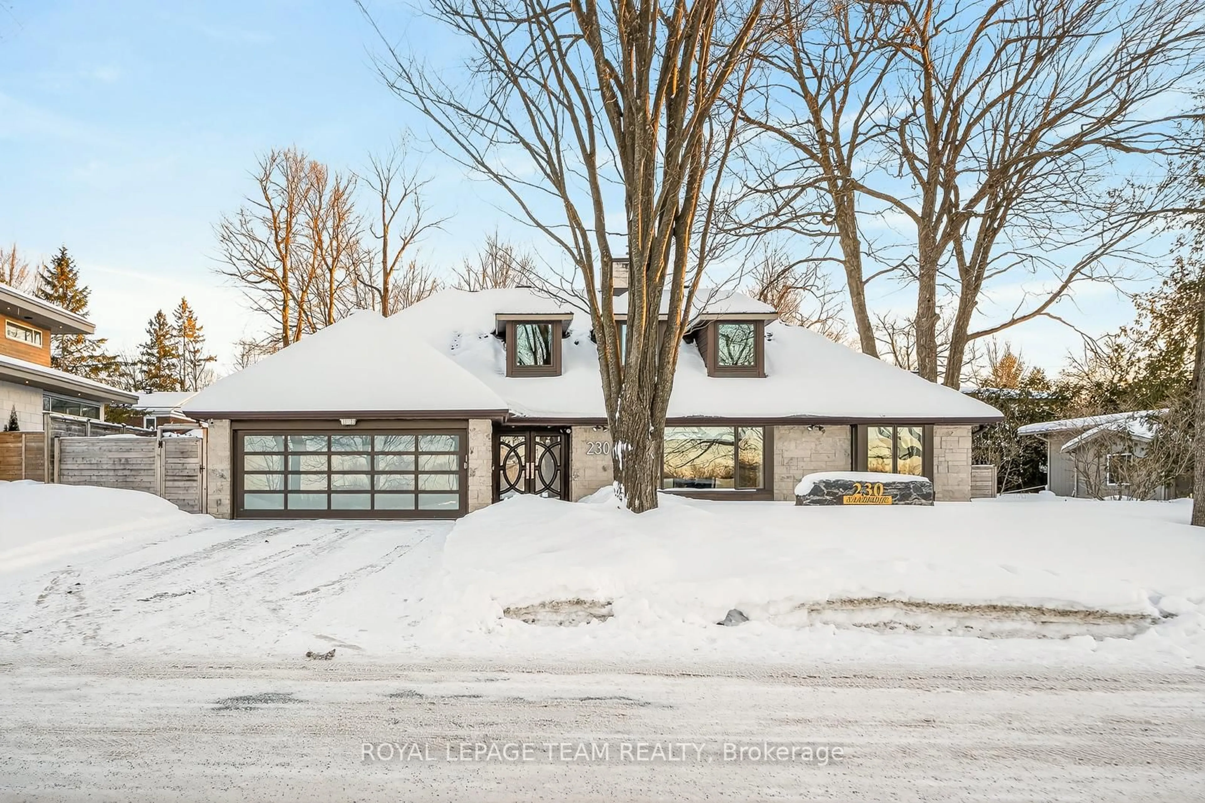 Home with brick exterior material, street for 230 Sandridge Rd, Ottawa Ontario K1L 5A2