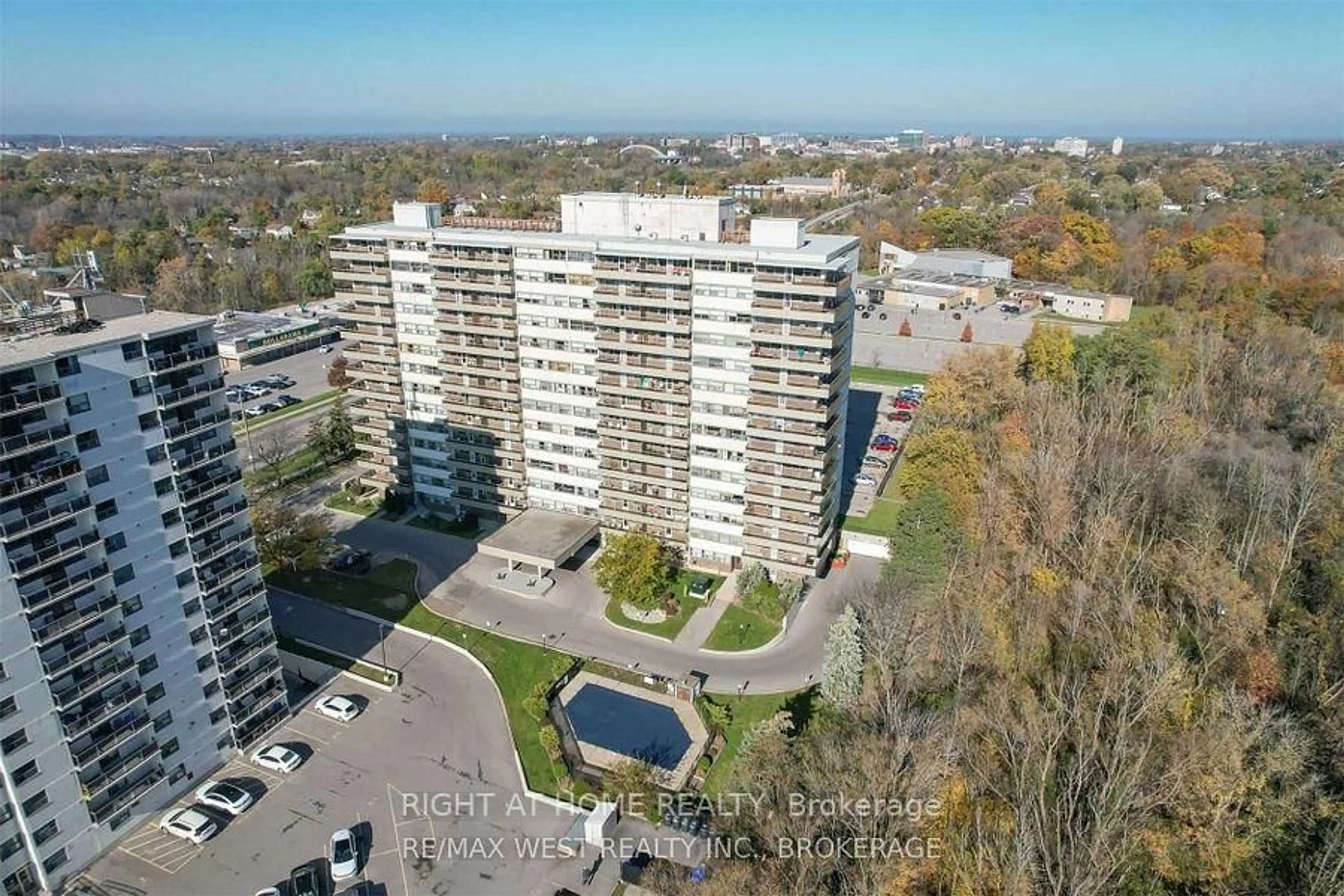 A pic from outside/outdoor area/front of a property/back of a property/a pic from drone, city buildings view from balcony for 215 Glenridge Ave #207, St. Catharines Ontario L2T 3J7