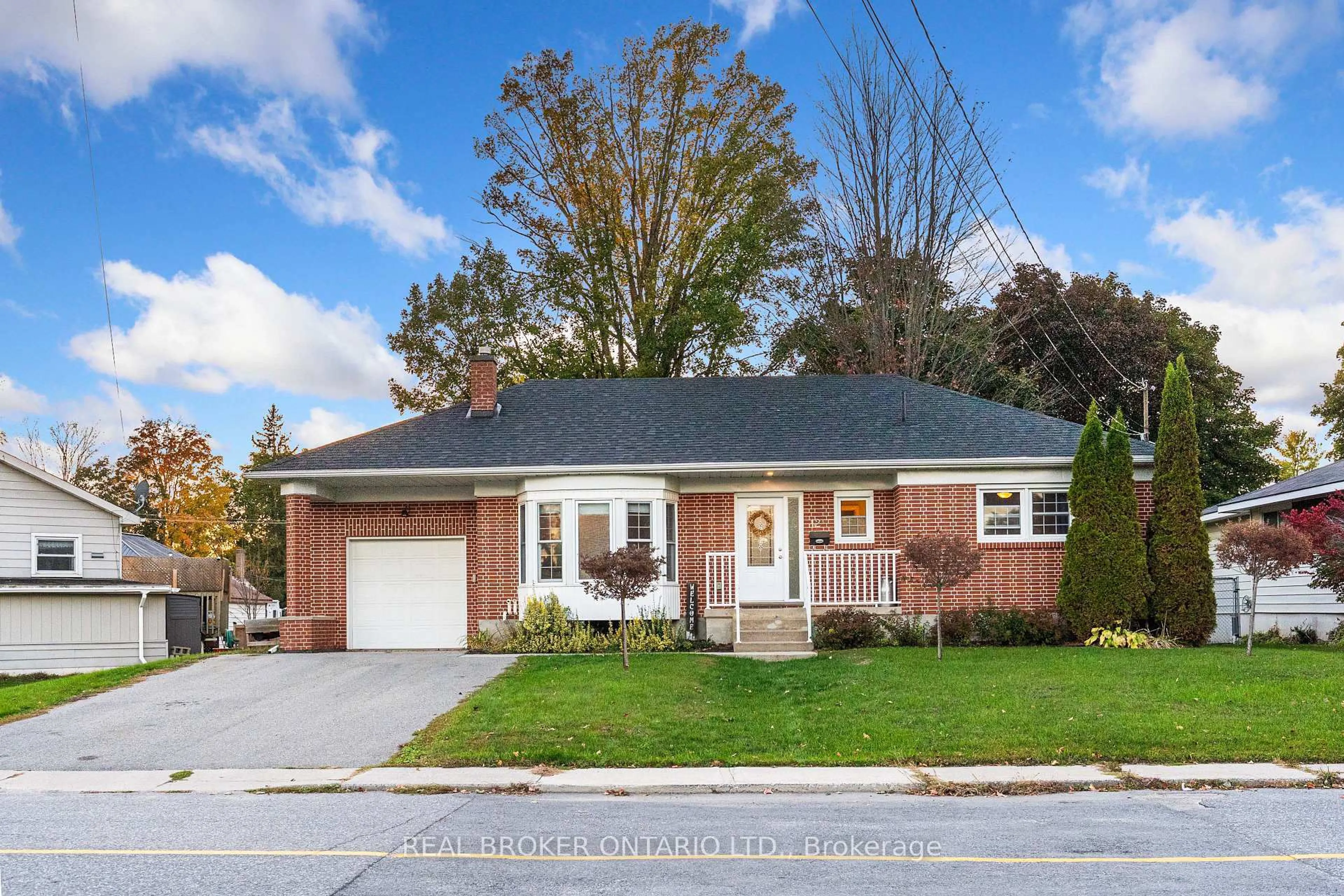 Home with brick exterior material, street for 12 Florence St, Smiths Falls Ontario K7A 4A3