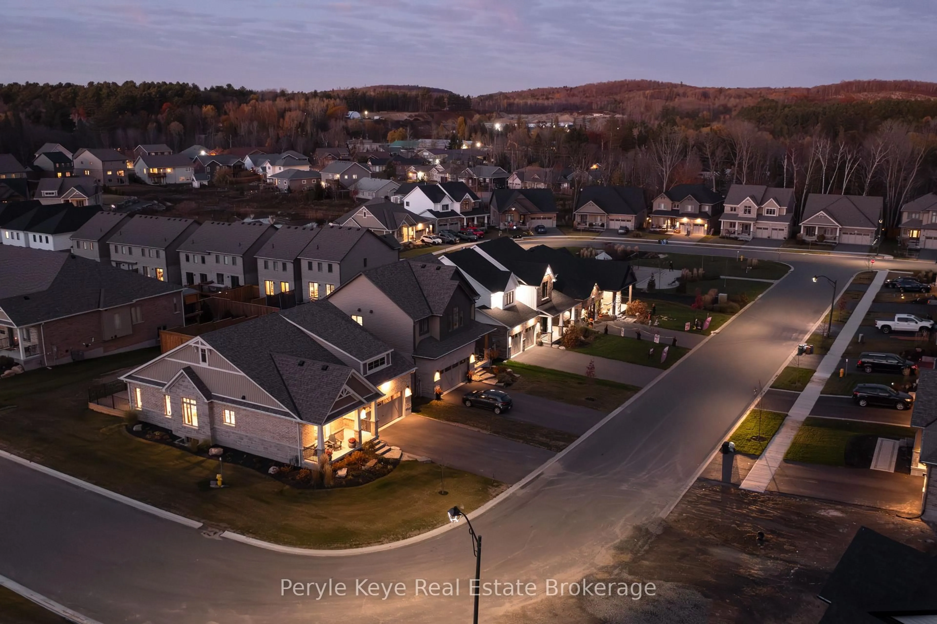 A pic from outside/outdoor area/front of a property/back of a property/a pic from drone, street for 14 Charles Morley Blvd, Huntsville Ontario P1H 0G5