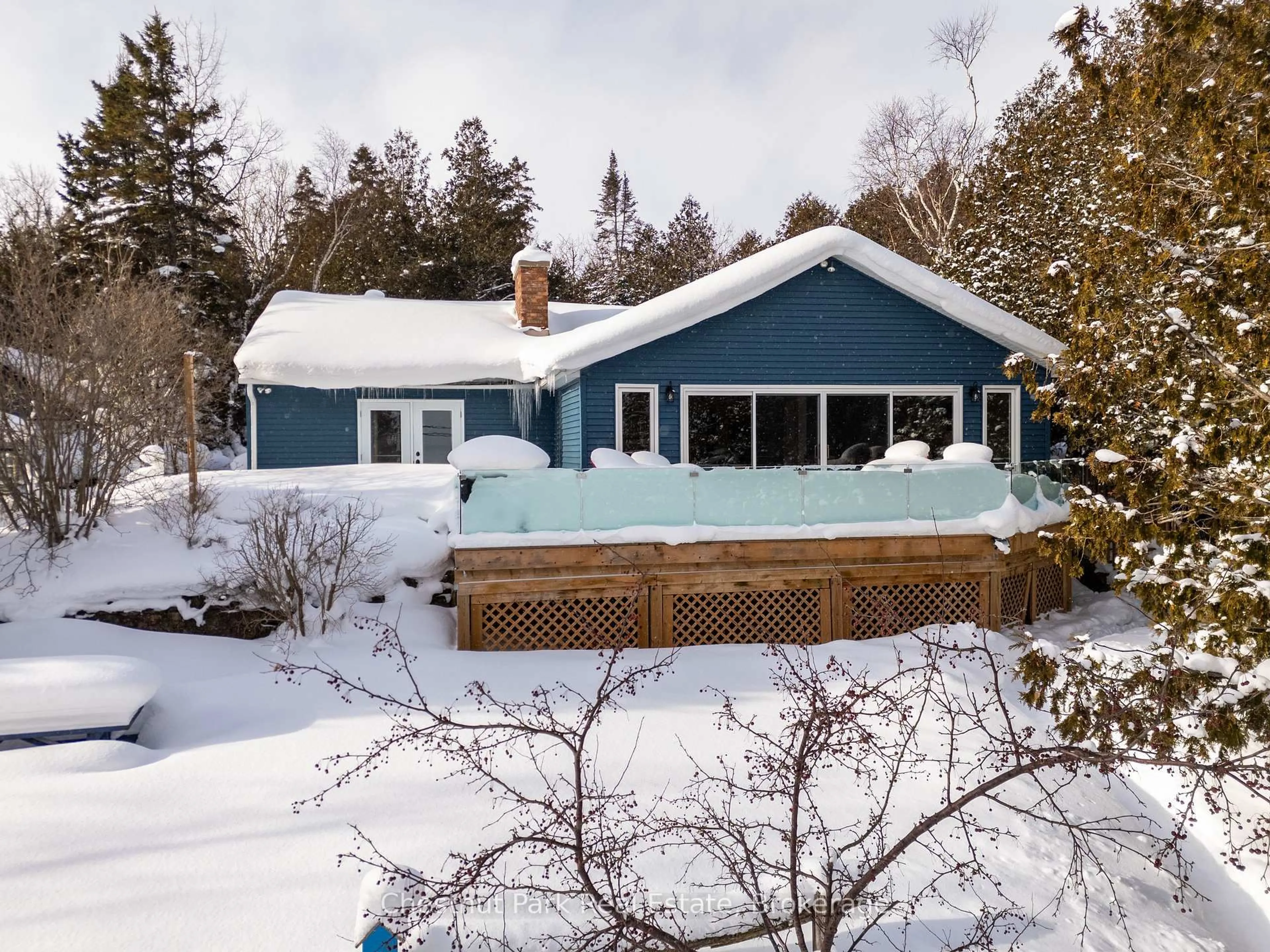 Home with vinyl exterior material, street for 129 & 130 Isthmus Bay Rd, Northern Bruce Peninsula Ontario N0H 1W0