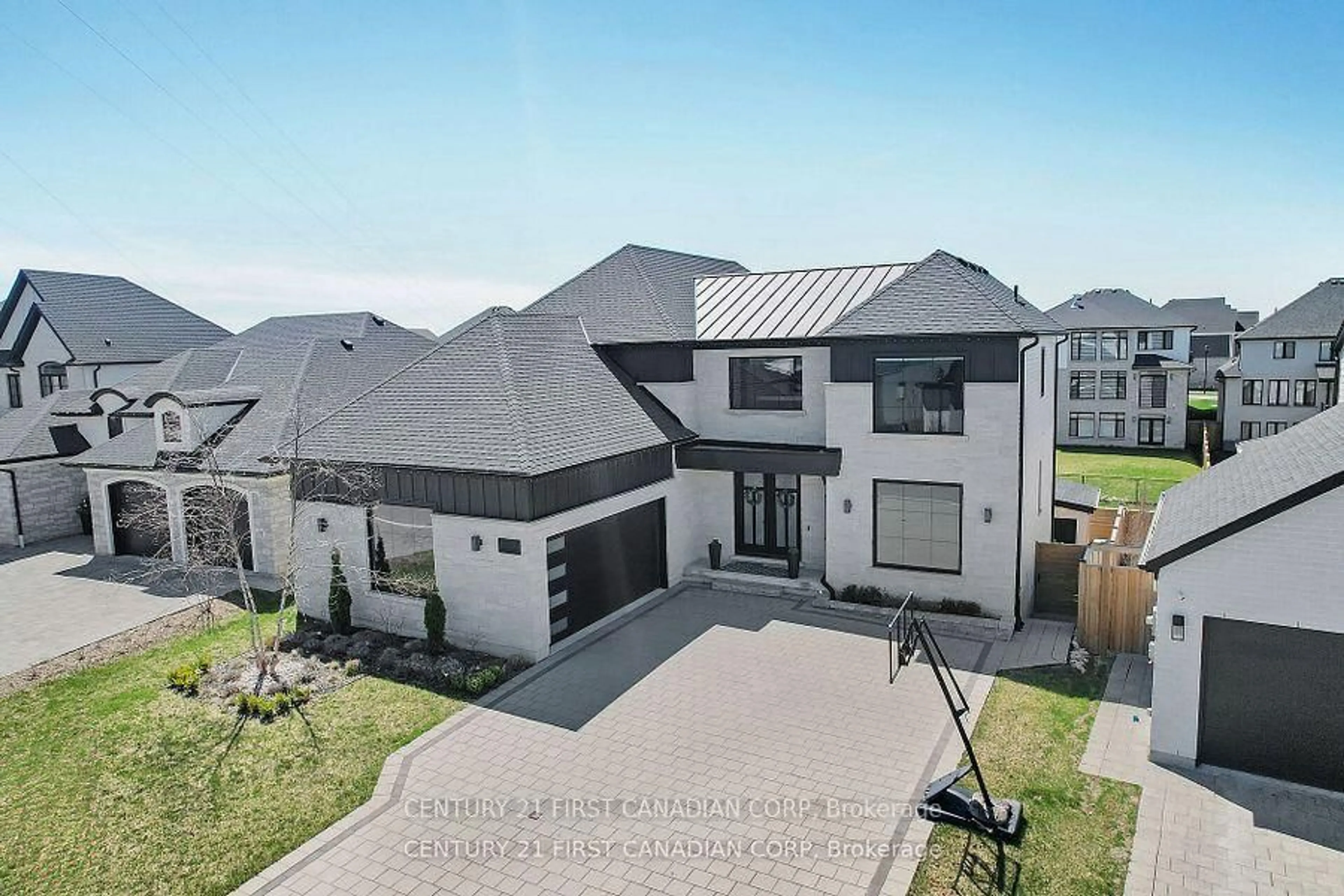 A pic from outside/outdoor area/front of a property/back of a property/a pic from drone, street for 1741 Upper West Ave, London South Ontario N6K 0J2