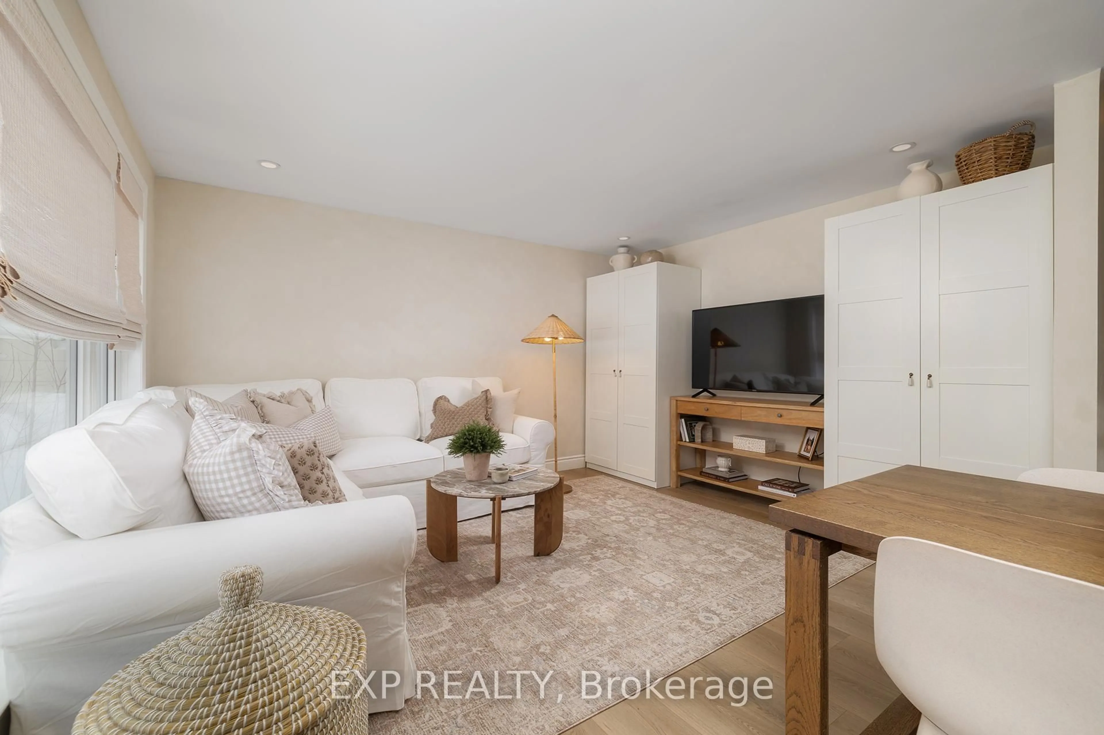 Living room with furniture, wood/laminate floor for 144 Rossford Cres, Kitchener Ontario N2M 2H7