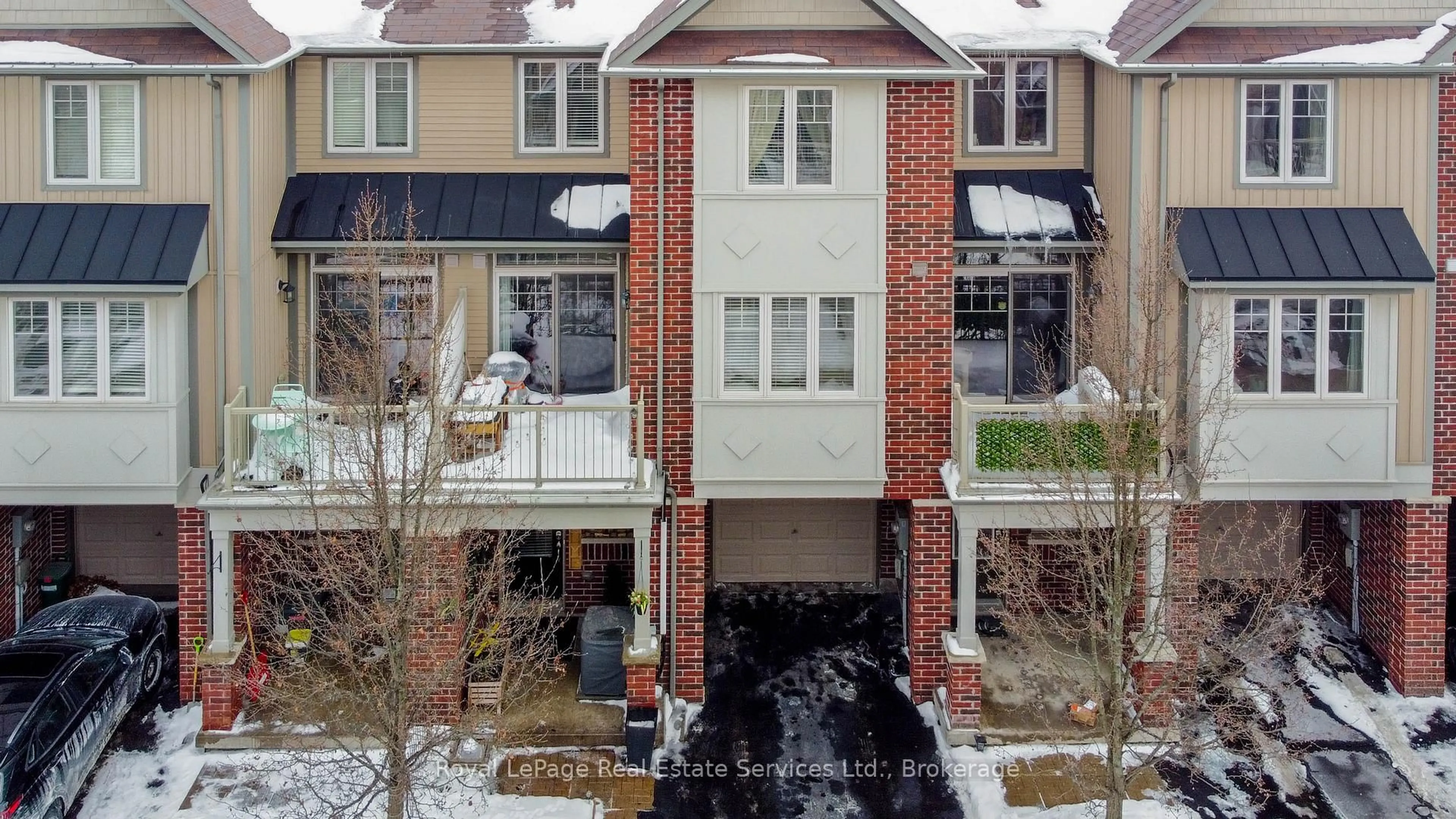 Home with brick exterior material, street for 310 Fall Fair Way #51, Hamilton Ontario L0R 1C0