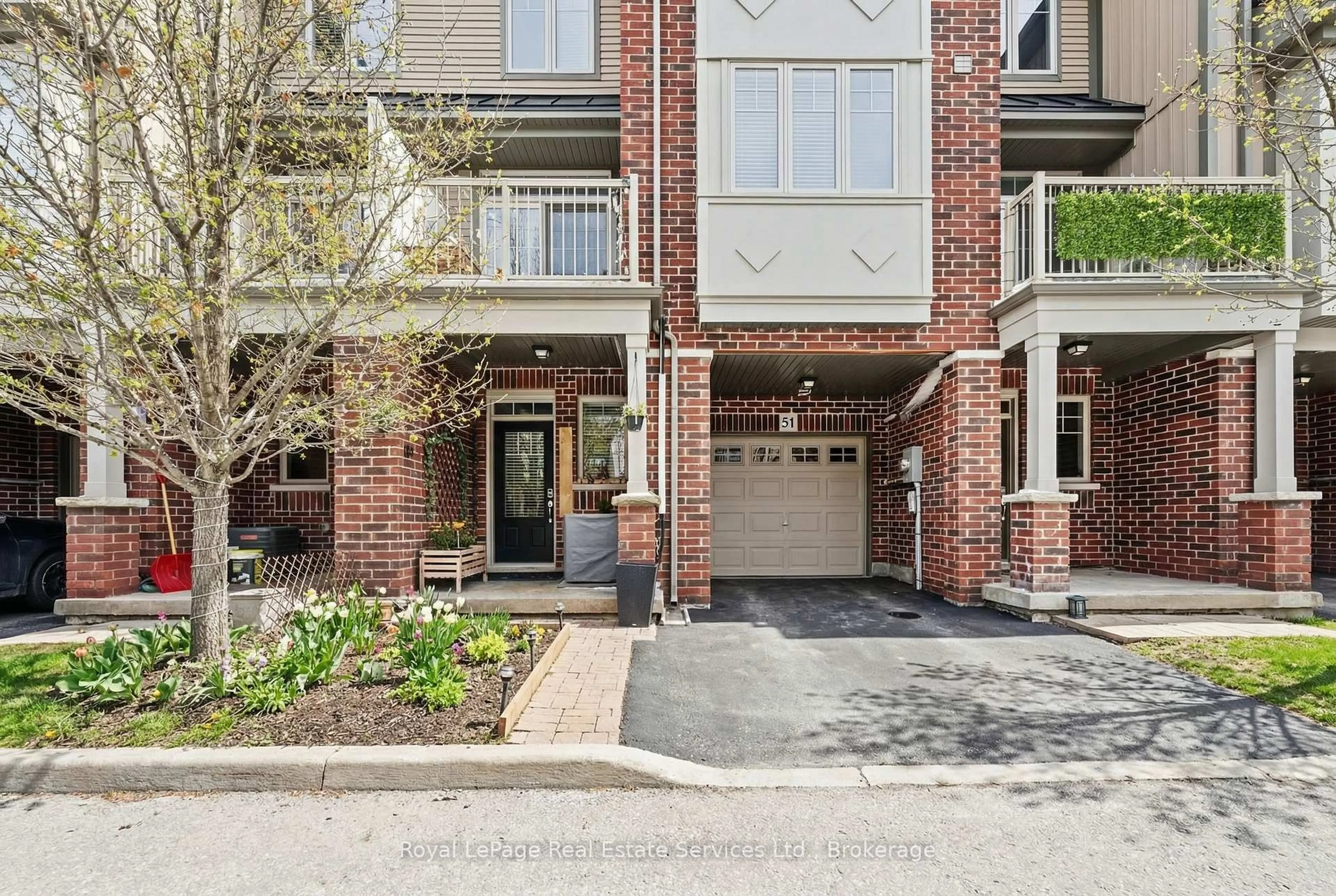 Home with brick exterior material, street for 310 Fall Fair Way #51, Hamilton Ontario L0R 1C0