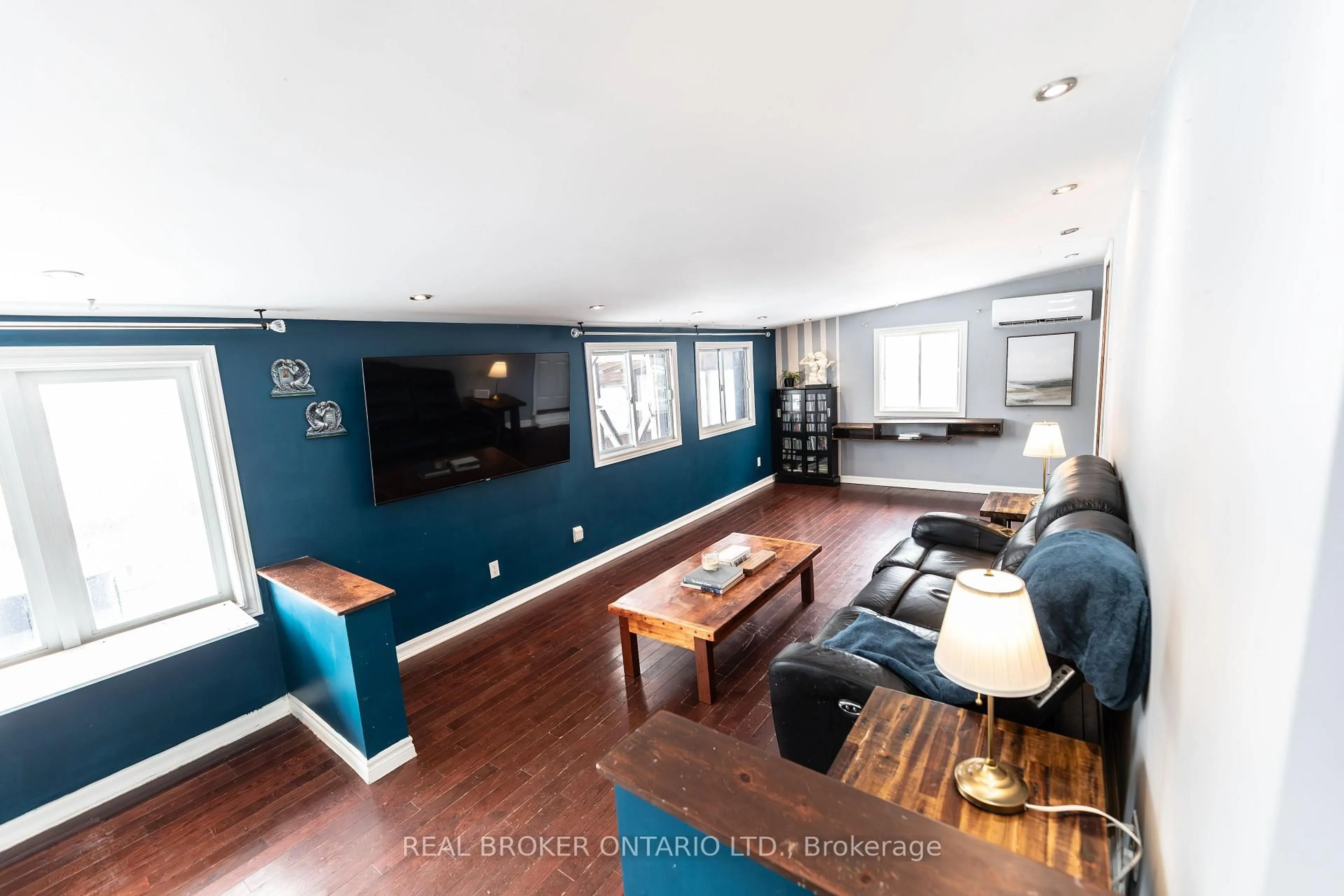 Living room with furniture, wood/laminate floor for 3 Fetherston Lane, North Grenville Ontario K0G 1T0