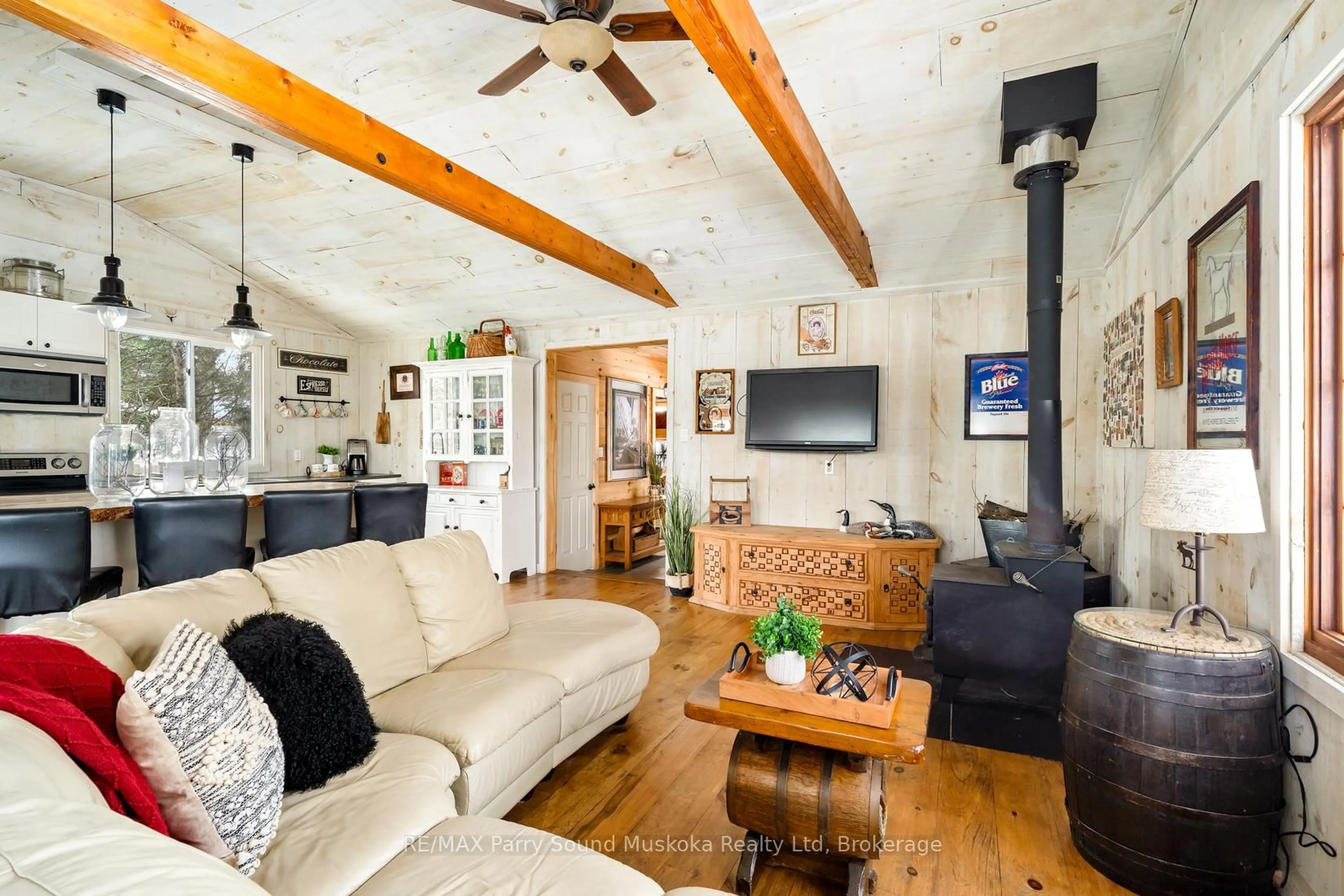 Living room with furniture, wood/laminate floor for 18 INVERLOCHY Rd, Carling Ontario P0G 1G0