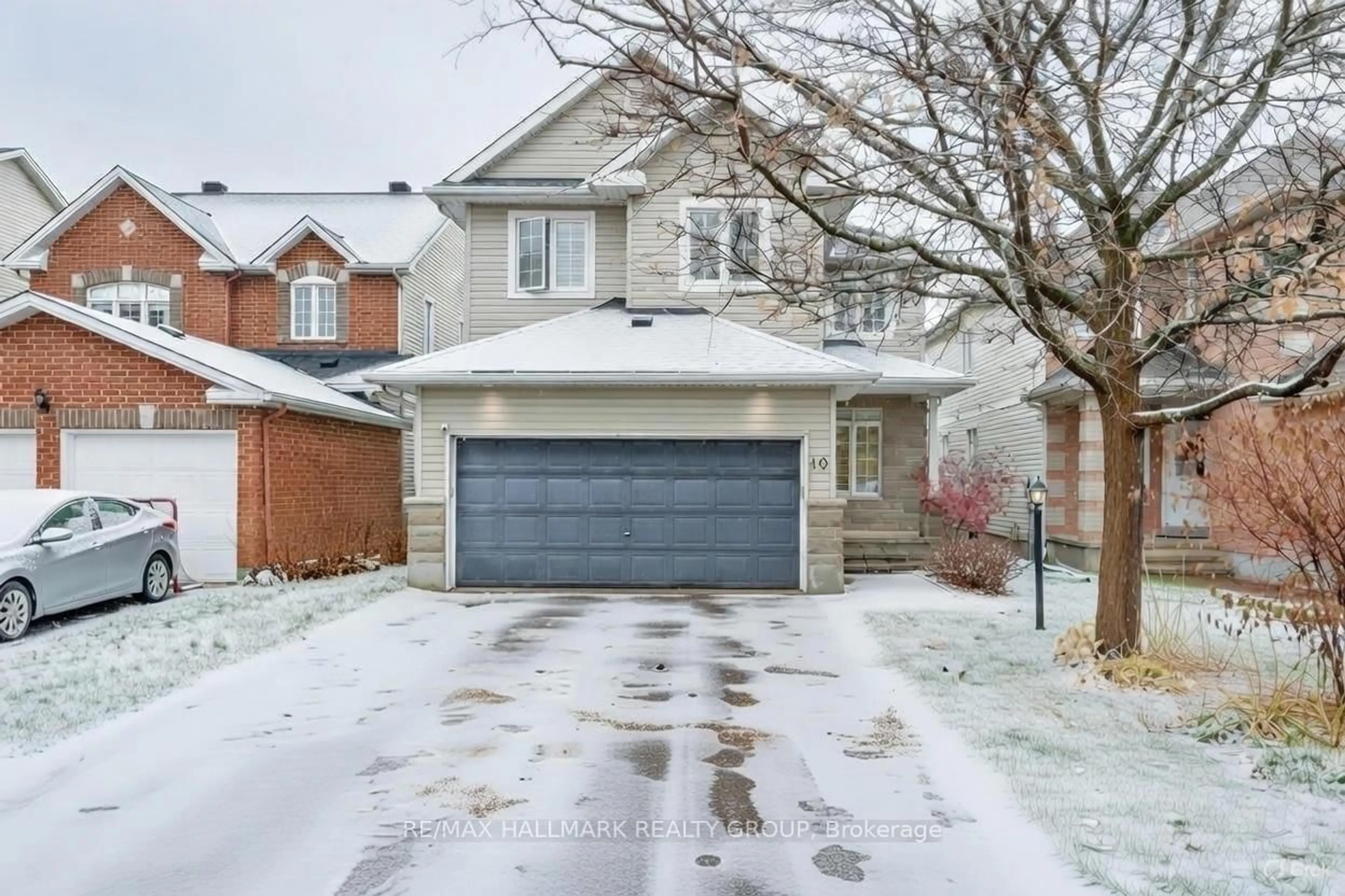 Home with brick exterior material, street for 10 Friendly Cres, Ottawa Ontario K2S 2B6