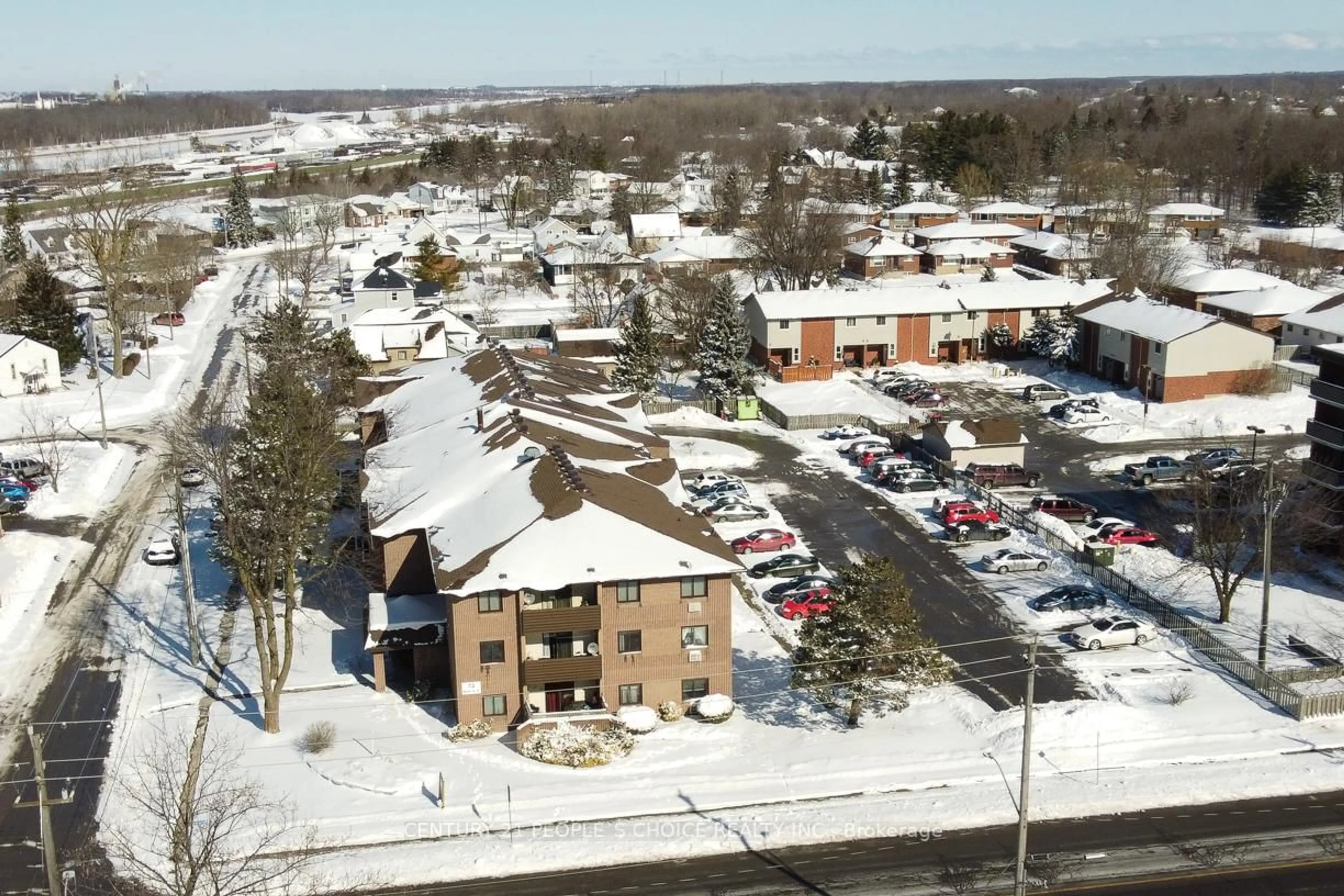 A pic from outside/outdoor area/front of a property/back of a property/a pic from drone, unknown for 72 Main St #107, Port Colborne Ontario L3K 5Z8
