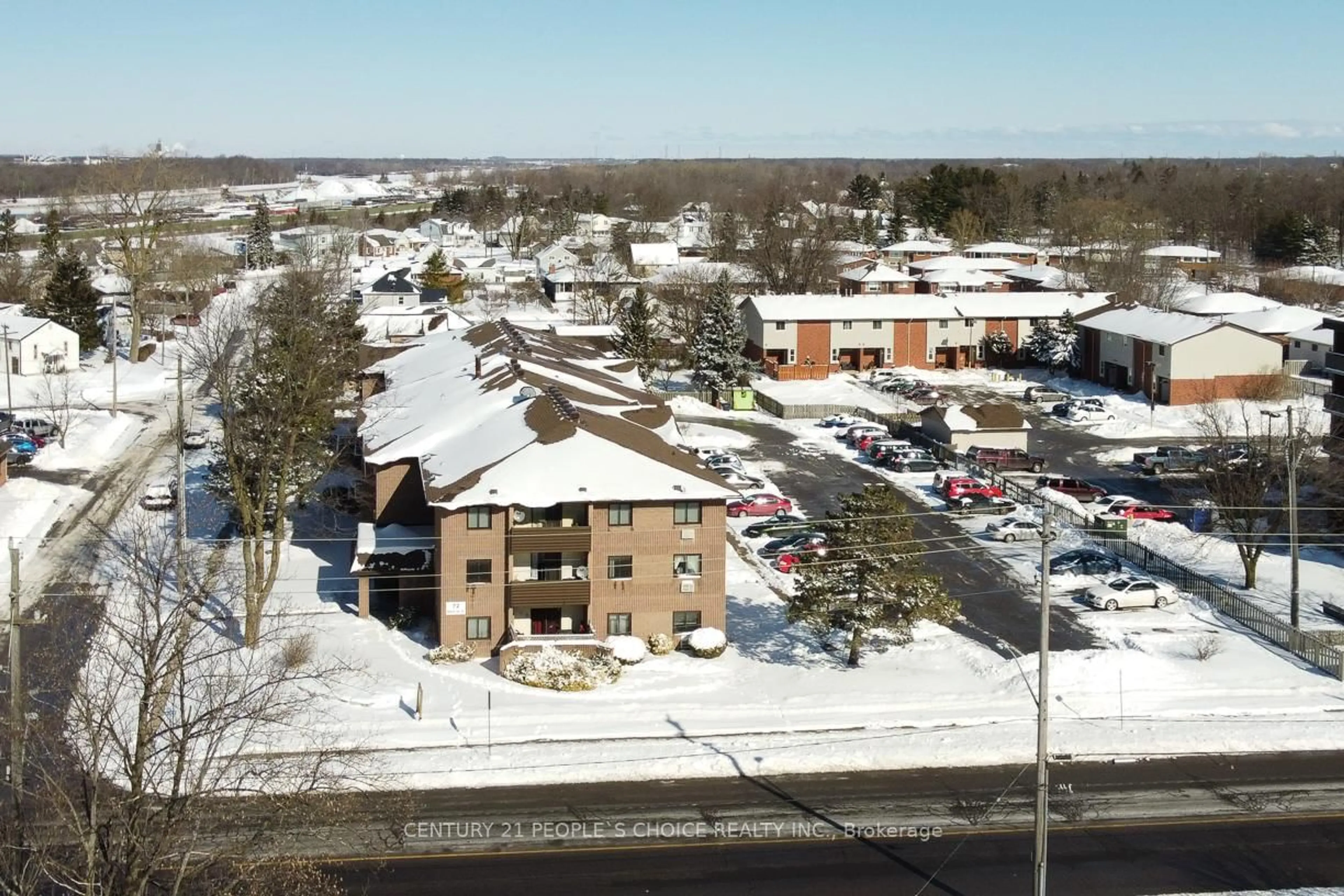 A pic from outside/outdoor area/front of a property/back of a property/a pic from drone, unknown for 72 Main St #107, Port Colborne Ontario L3K 5Z8