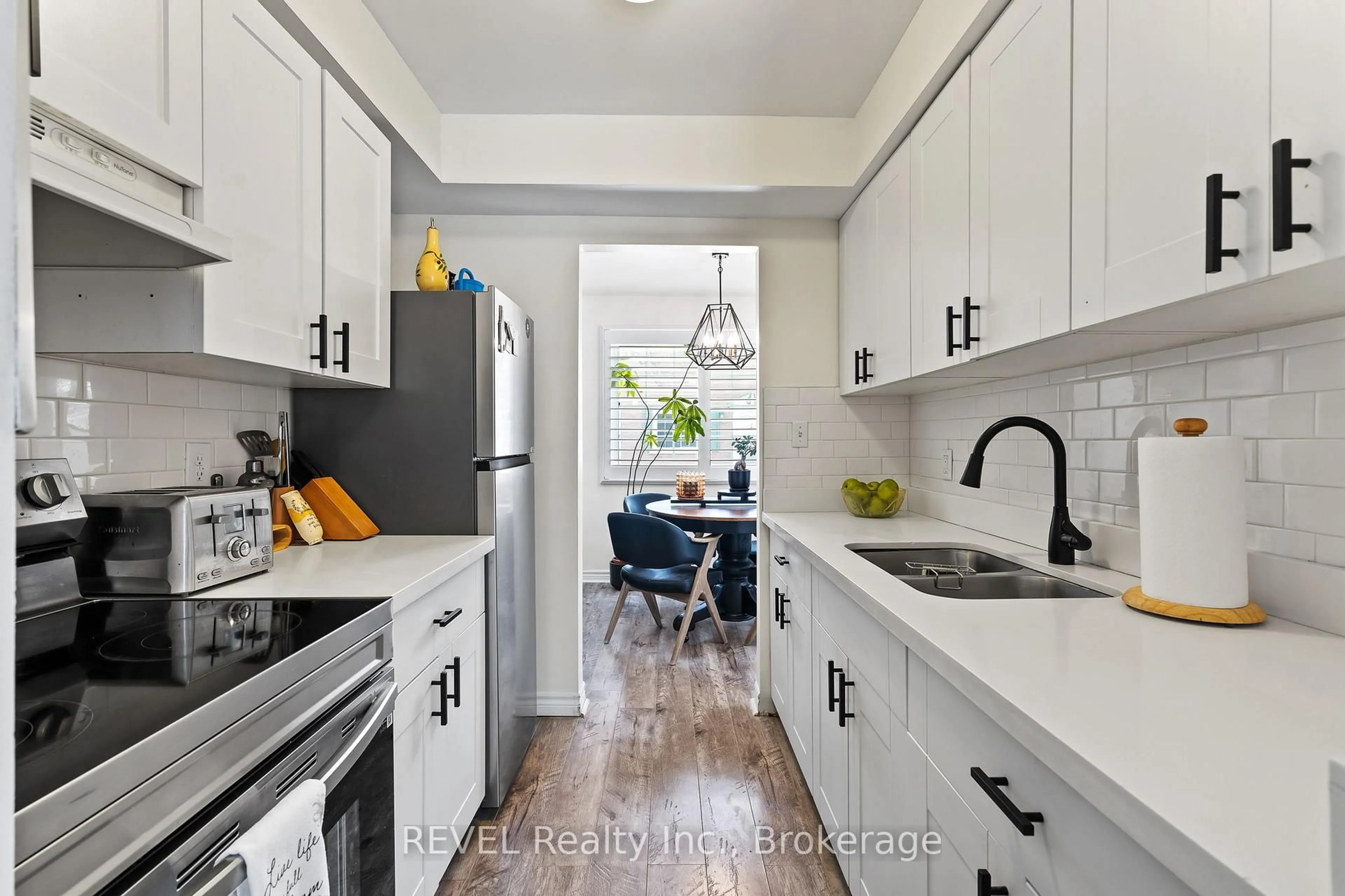 Open concept kitchen, ceramic/tile floor for 5852 FRONTENAC St #3, Niagara Falls Ontario L2G 3A9