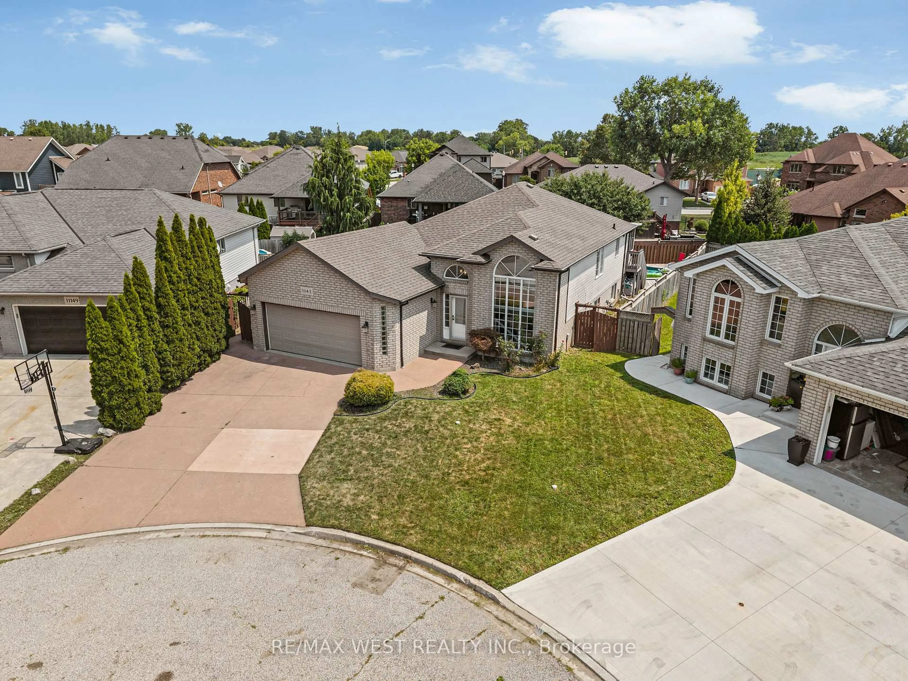 A pic from outside/outdoor area/front of a property/back of a property/a pic from drone, street for 11143 Ancona Cres, Windsor Ontario N8R 2K2