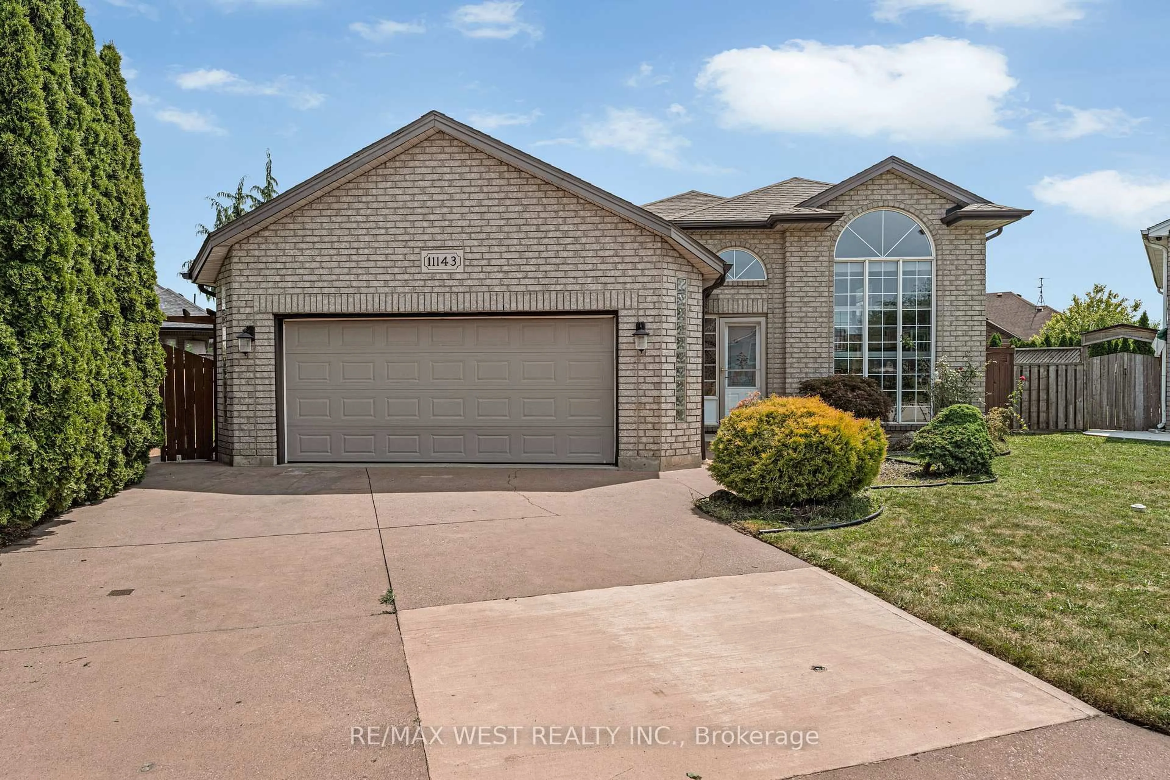 Home with brick exterior material, street for 11143 Ancona Cres, Windsor Ontario N8R 2K2