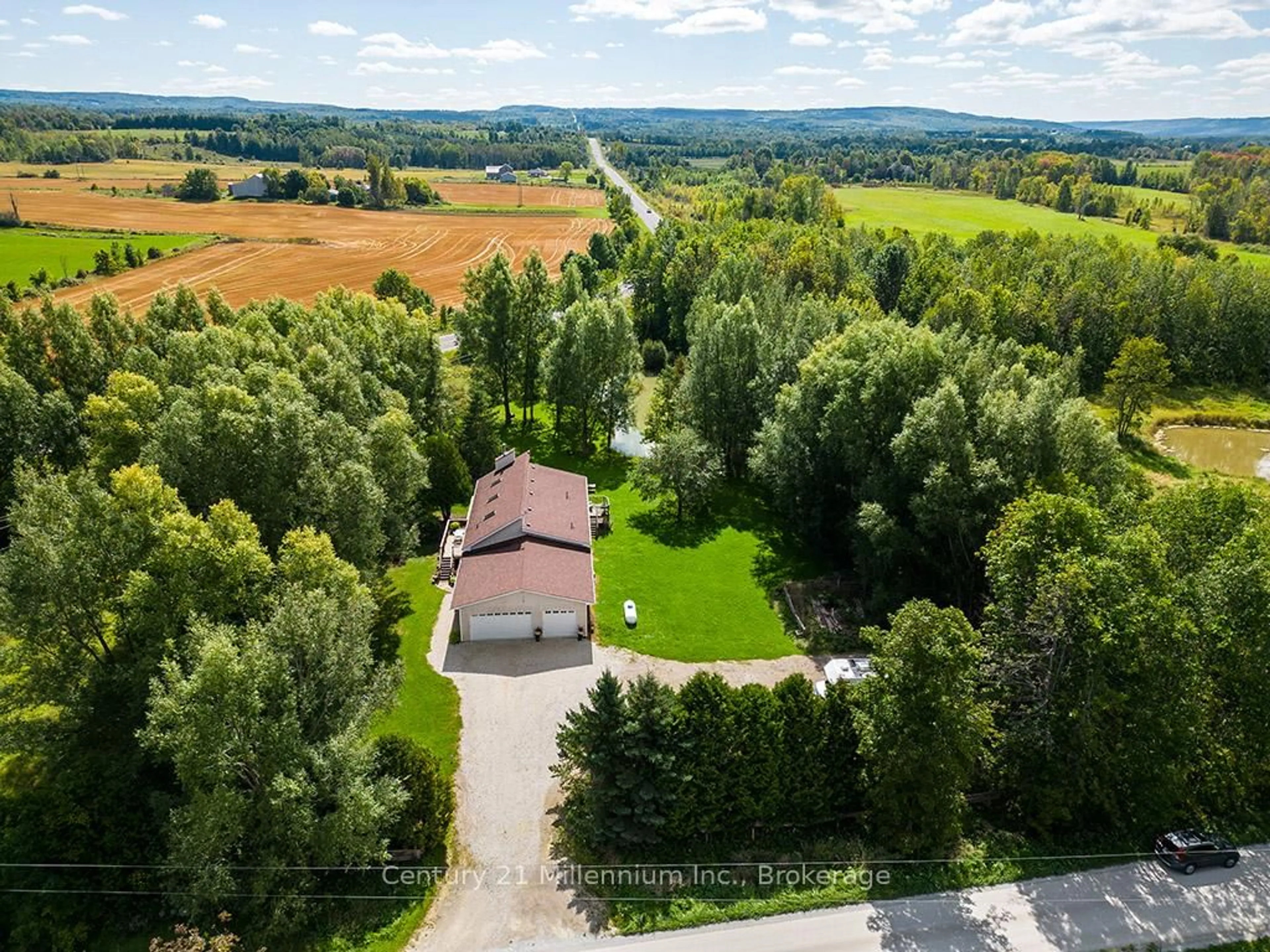 A pic from outside/outdoor area/front of a property/back of a property/a pic from drone, forest/trees view for 727302 22 C Sdrd, Blue Mountains Ontario N0H 1N0