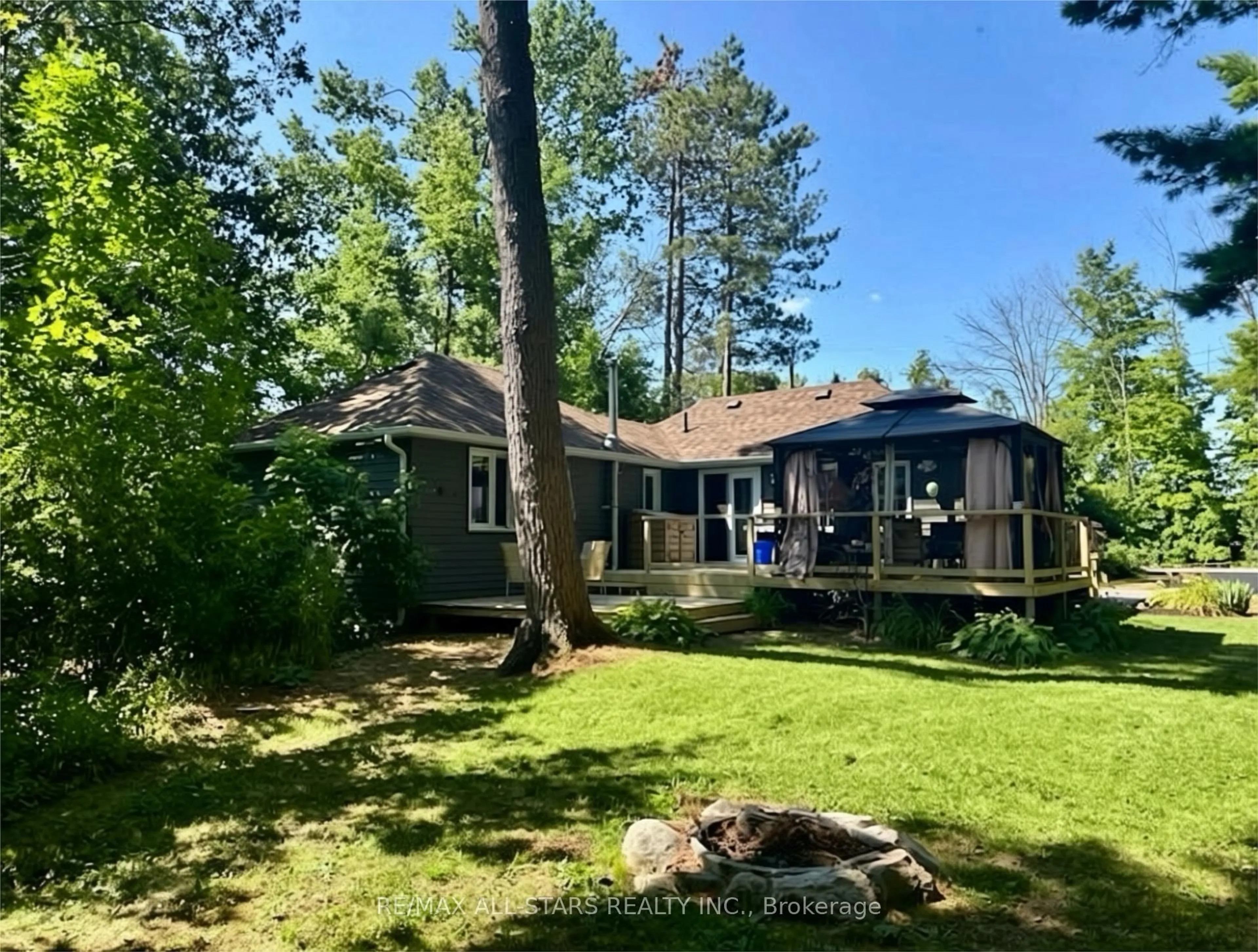 A pic from outside/outdoor area/front of a property/back of a property/a pic from drone, forest/trees view for 29 Stinsons Bay Rd, Kawartha Lakes Ontario K0M 1N0