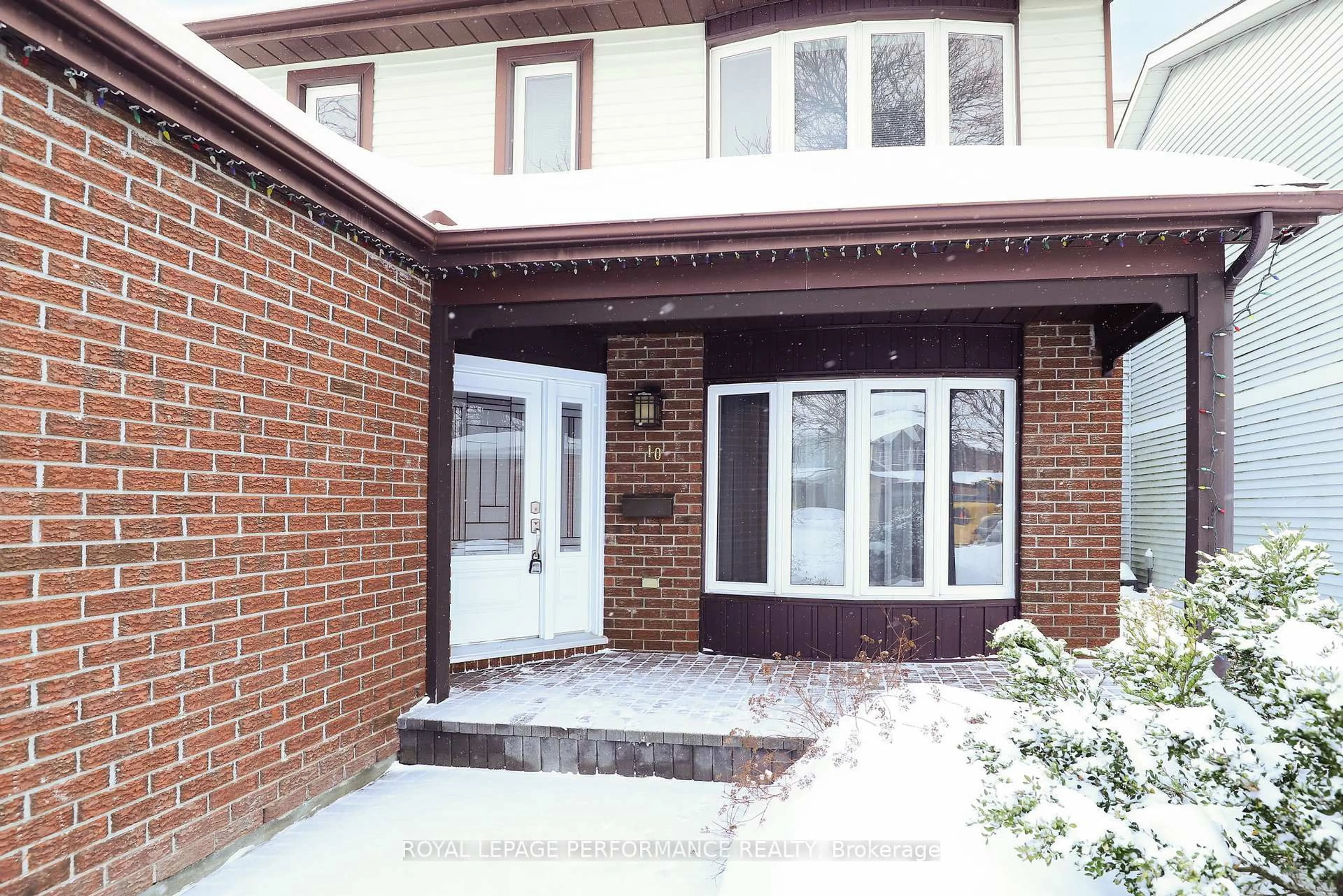 Home with brick exterior material, street for 10 Ellisson Way, Ottawa Ontario K1G 4N8