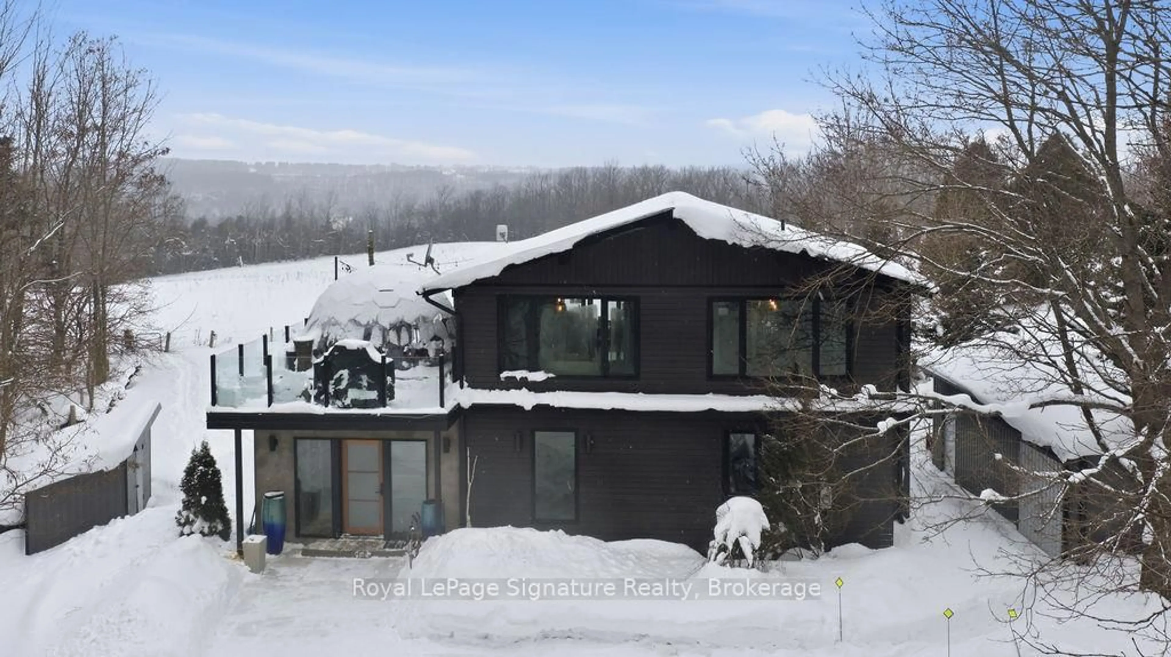 A pic from outside/outdoor area/front of a property/back of a property/a pic from drone, mountain view for 194552 13 GREY Rd, Grey Highlands Ontario N0C 1E0