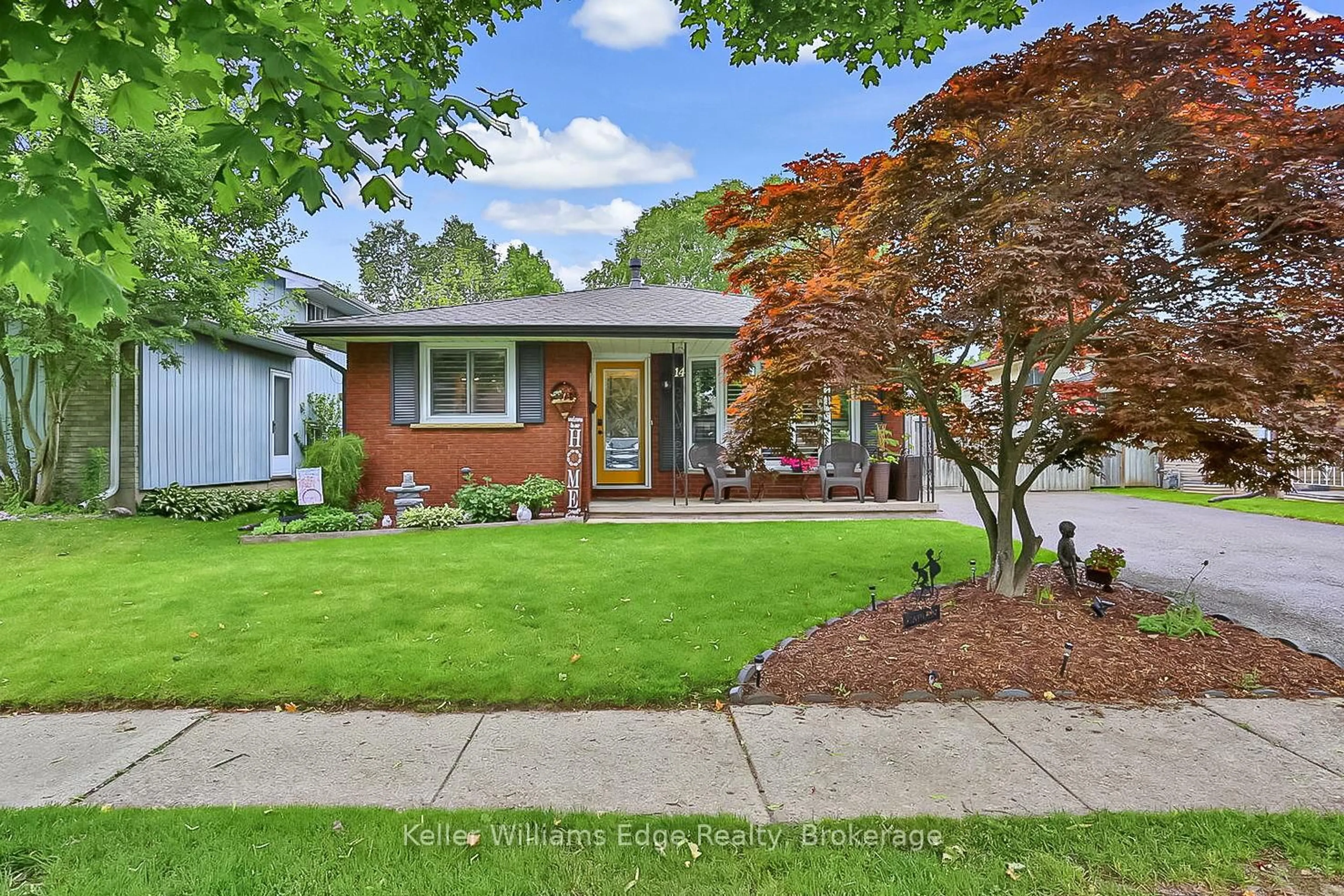 Home with brick exterior material, street for 14 Waxwing Way, Brantford Ontario N3R 6G1