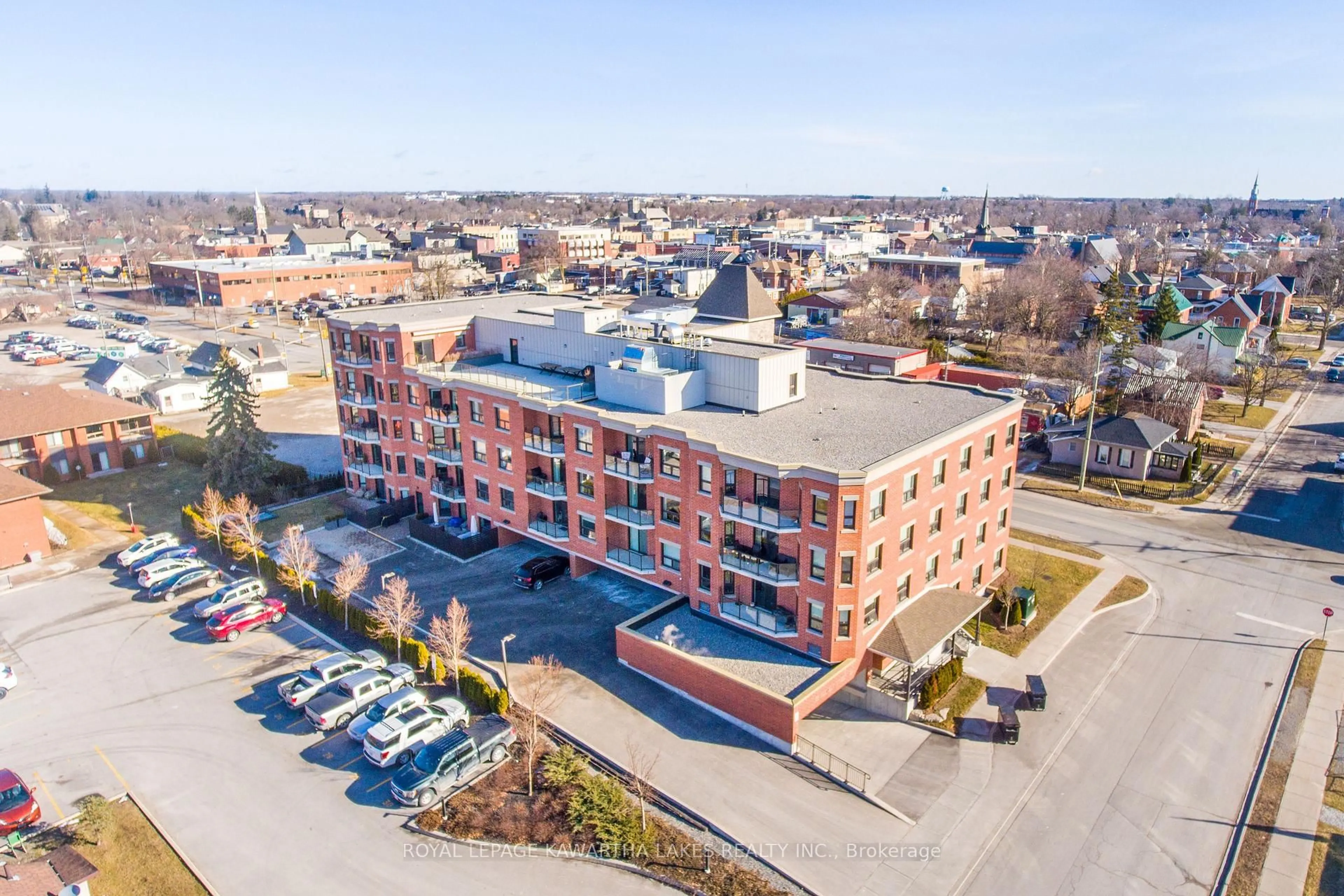A pic from outside/outdoor area/front of a property/back of a property/a pic from drone, building for 58 Glenelg St #103, Kawartha Lakes Ontario K9V 0M9