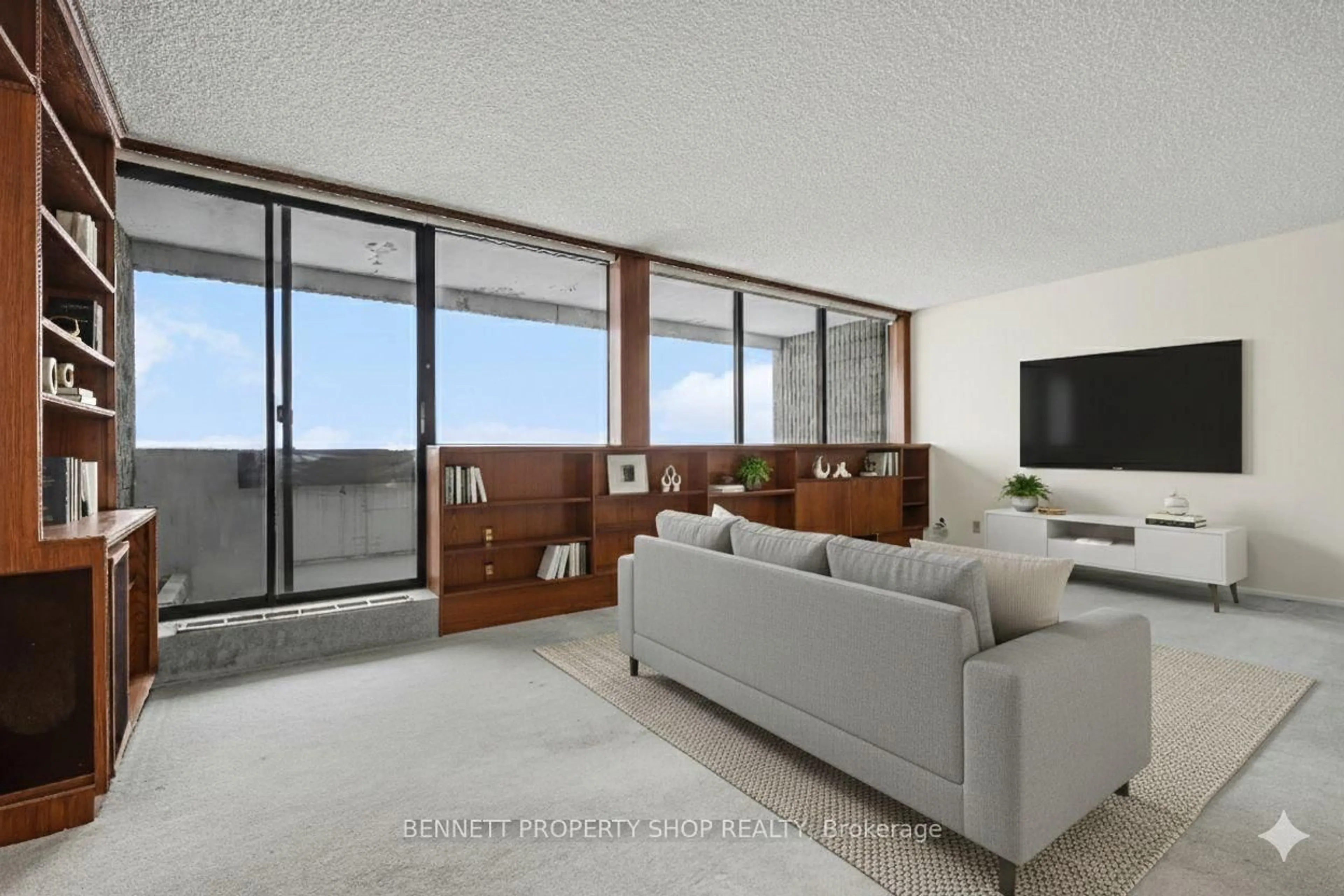 Living room with furniture, unknown for 1285 Cahill Dr #2003, Ottawa Ontario K1V 9A7