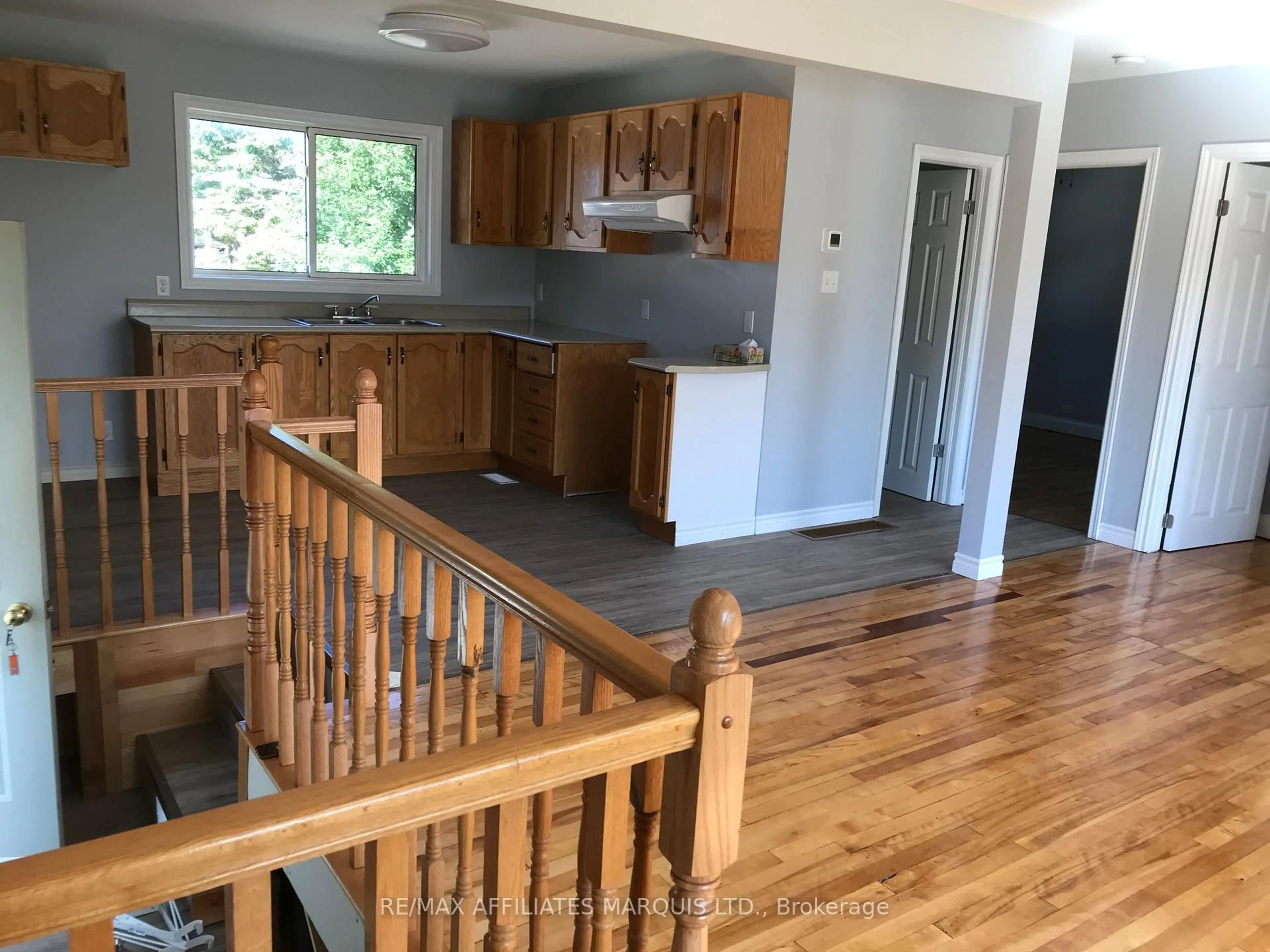Open concept kitchen, wood/laminate floor for 2036 Pitt St, Cornwall Ontario K6J 5G3
