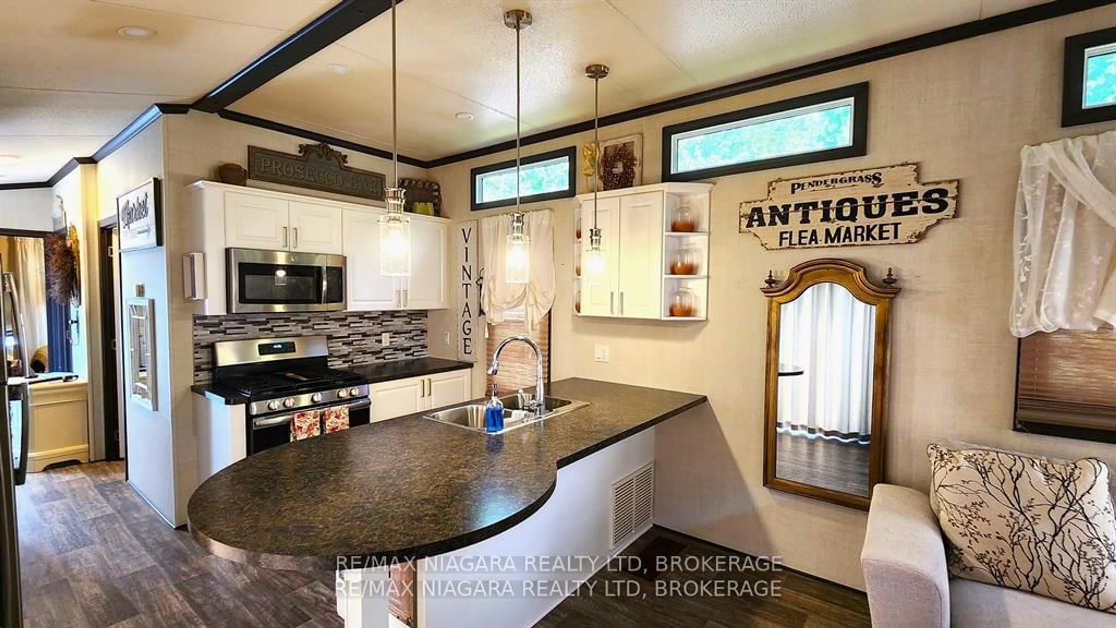 Open concept kitchen, ceramic/tile floor for 8845 Lundy's Lane #246, Niagara Falls Ontario L2H 1H5