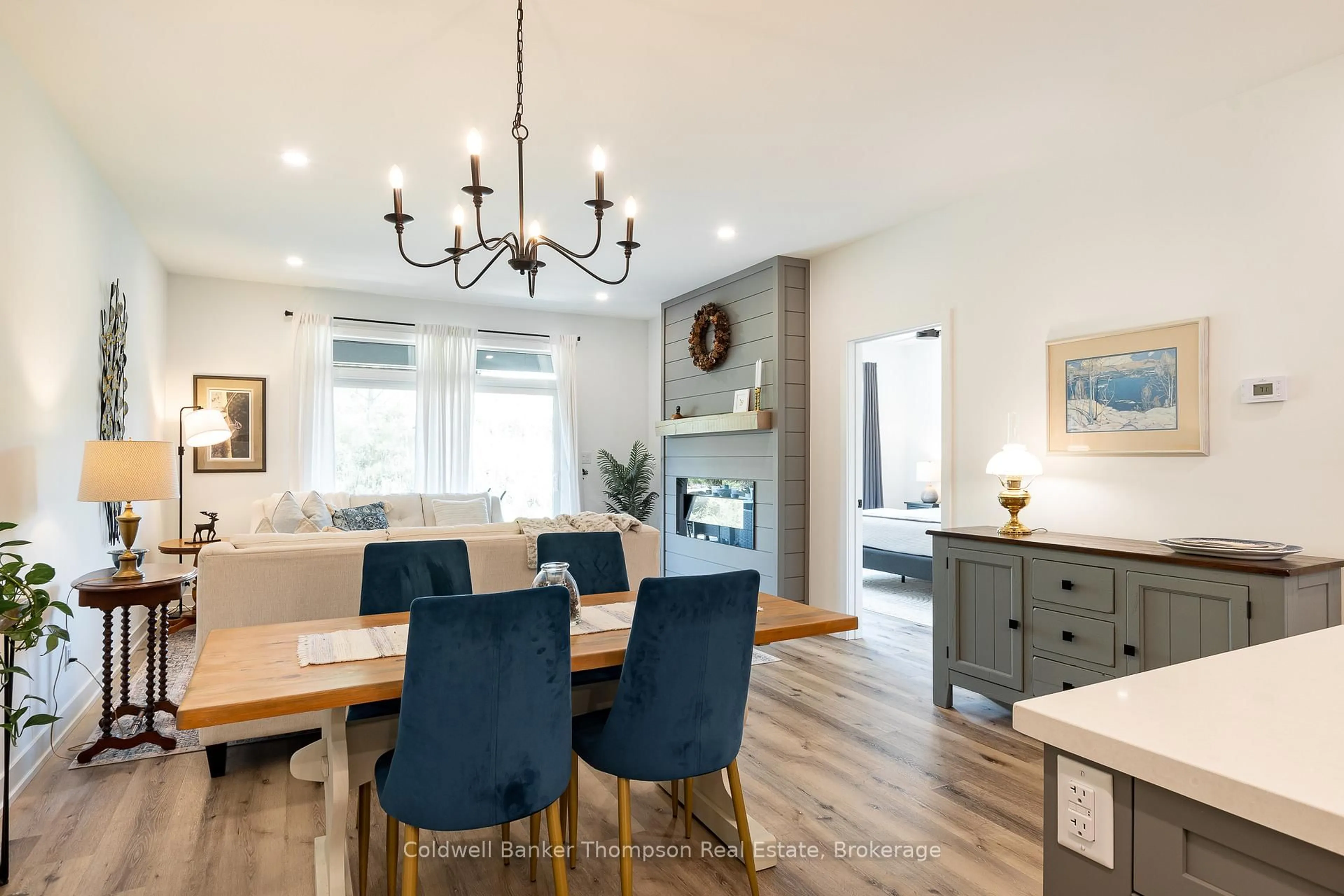 Open concept kitchen, wood/laminate floor for 12 Blue Birch Lane, Huntsville Ontario P1H 0G4