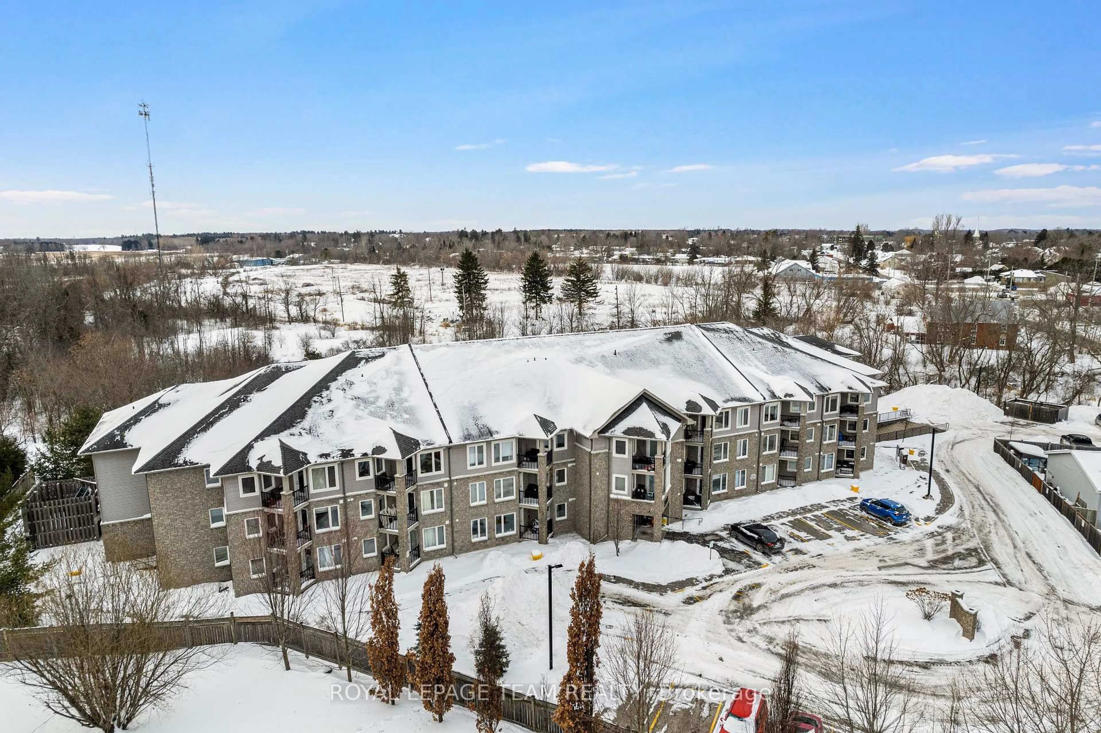 A pic from outside/outdoor area/front of a property/back of a property/a pic from drone, mountain view for 398 Van Buren St #205, North Grenville Ontario K0G 1J0