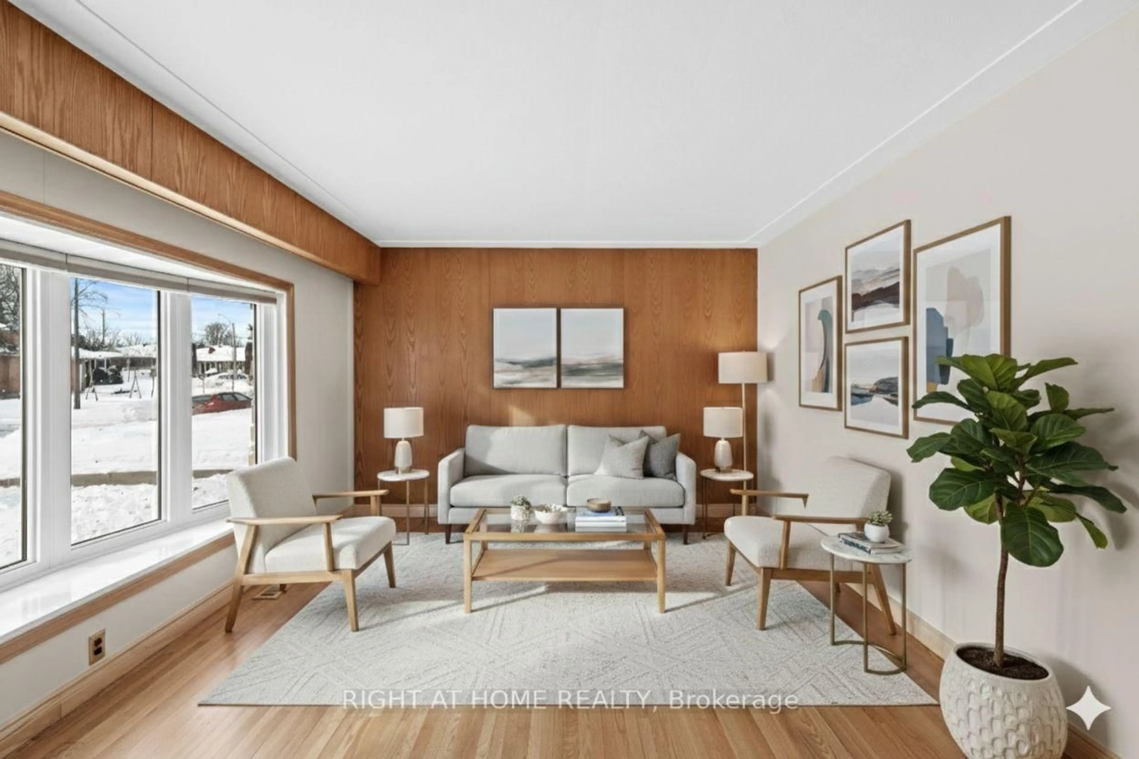 Living room with furniture, wood/laminate floor for 757 Dickens Ave, Ottawa Ontario K1G 2X9