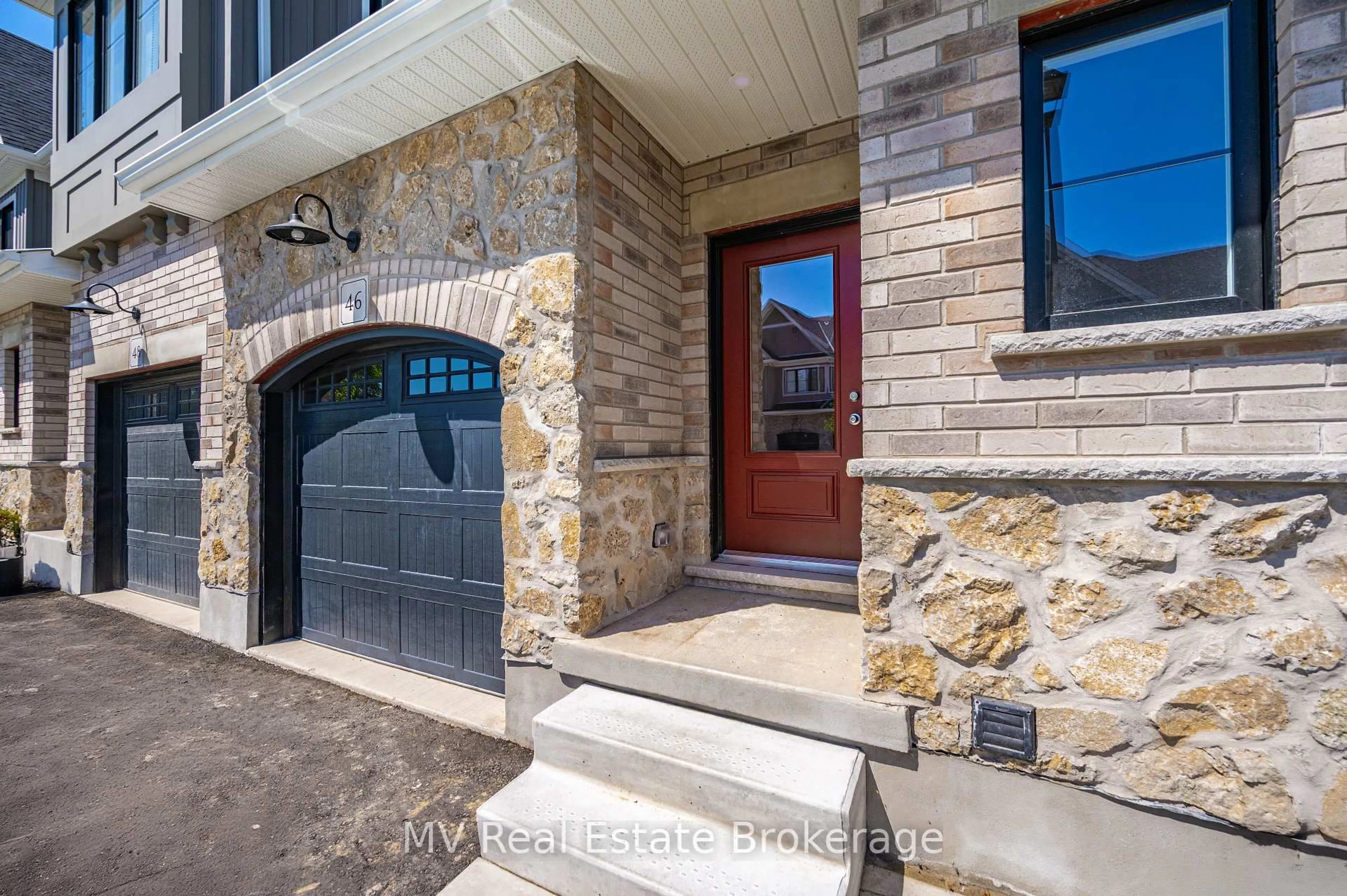 Home with brick exterior material, street for 46 Fieldstone Lane Private, Centre Wellington Ontario N0B 1S0